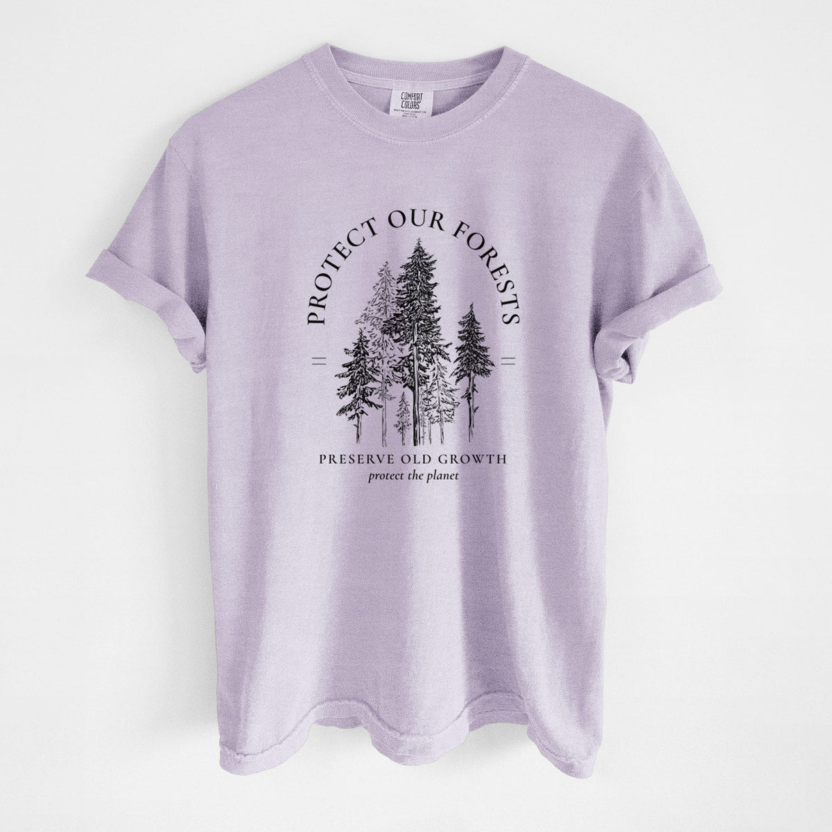 Orchid purple Comfort Colors t-shirt laid flat, printed with a black ink illustration of a stand of tall pine trees, framed by the words Protect Our Forests, Preserve Old Growth.