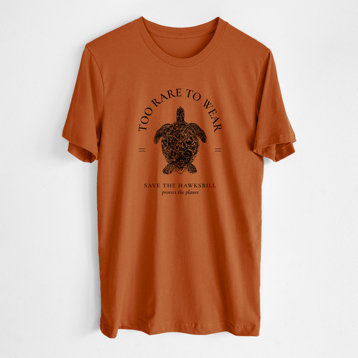 Autumn lightweight cotton t-shirt laid flat, printed with a black ink hawksbill sea turtle framed by the words Too Rare to Wear, Save the Hawksbill.