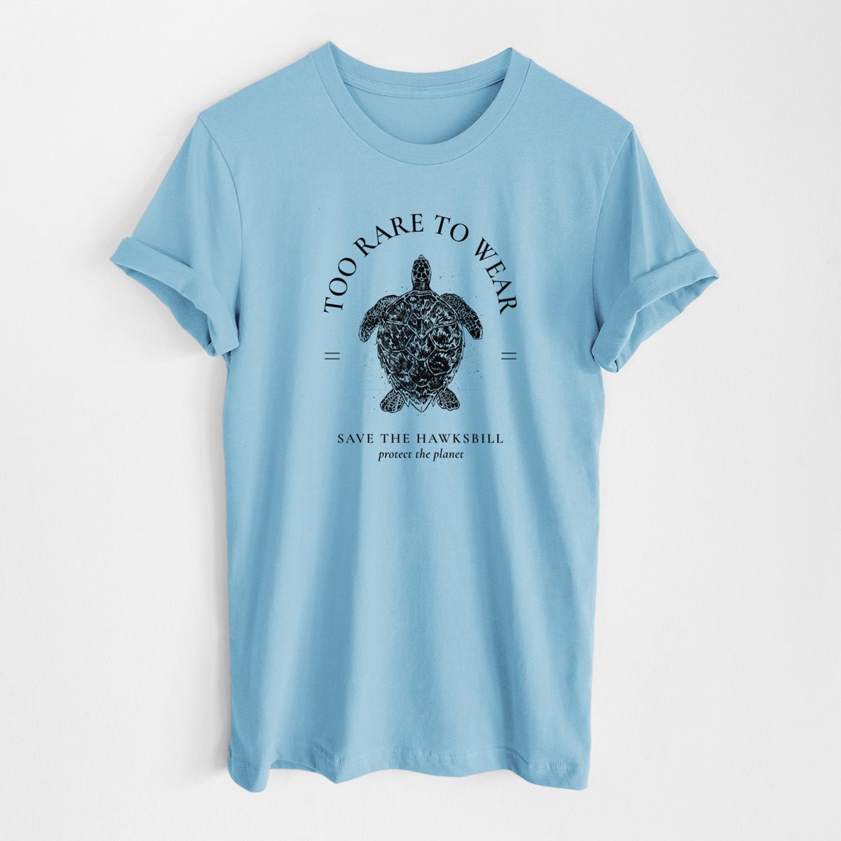 Ocean blue lightweight cotton t-shirt laid flat, printed with a black ink hawksbill sea turtle framed by the words Too Rare to Wear, Save the Hawksbill.