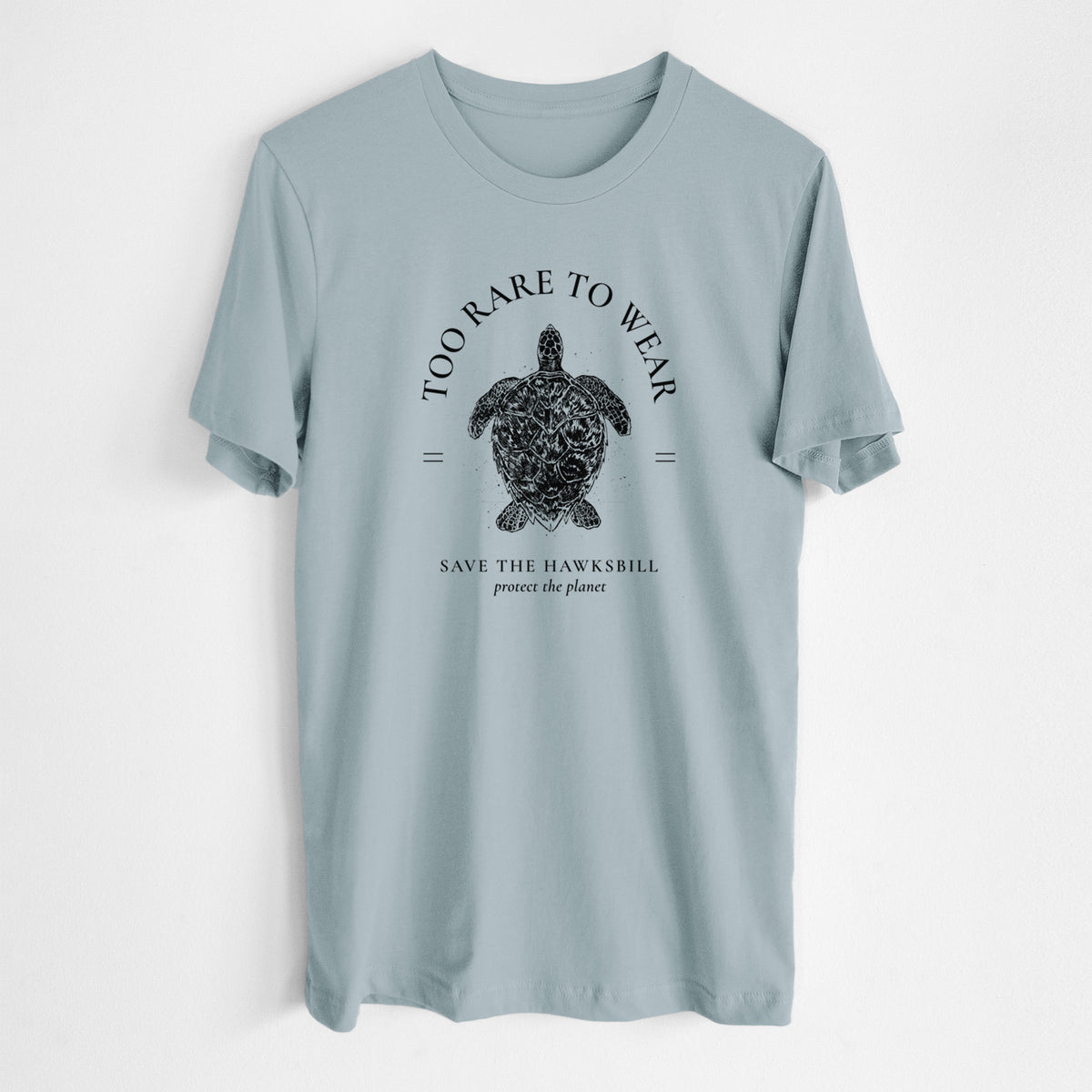 Vintage denim lightweight cotton t-shirt laid flat, printed with a black ink hawksbill sea turtle framed by the words Too Rare to Wear, Save the Hawksbill.