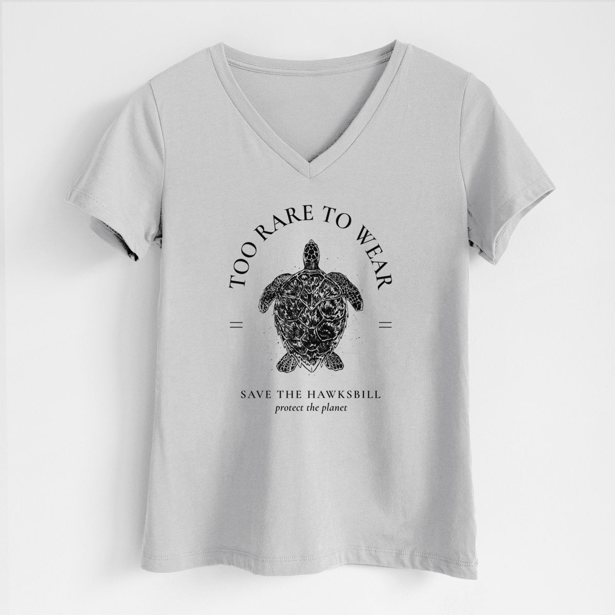 Lunar grey women's relaxed fit cotton V-neck t-shirt laid flat, printed with a black ink hawksbill sea turtle framed by the words Too Rare to Wear, Save the Hawksbill.