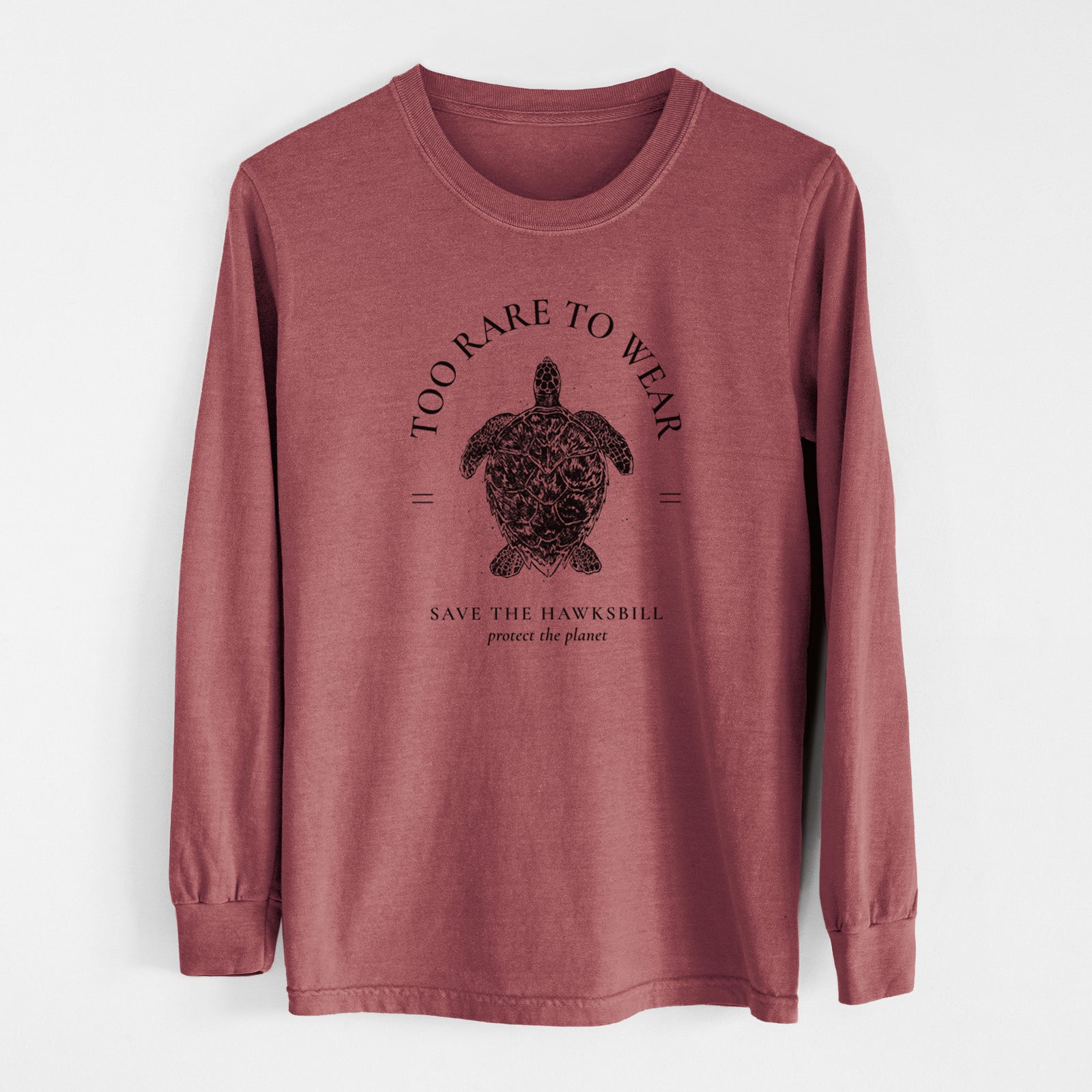 Ivory Comfort Colors long sleeve shirt laid flat, printed with a black ink hawksbill sea turtle framed by the words Too Rare to Wear, Save the Hawksbill.