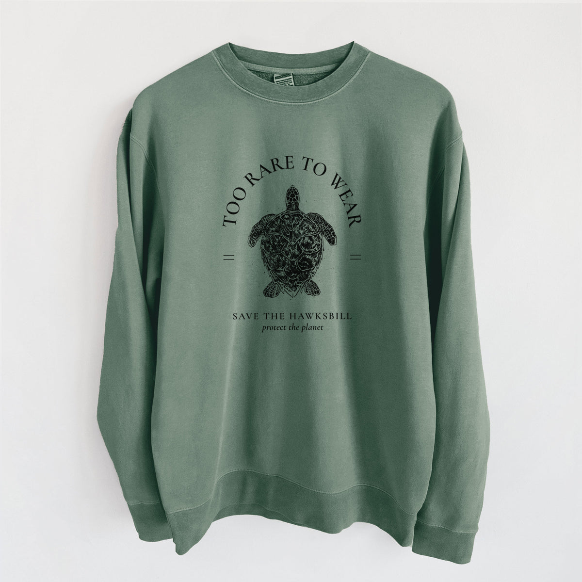 Alpine green pigment dyed crewneck sweatshirt laid flat, printed with a black ink hawksbill sea turtle framed by the words Too Rare to Wear, Save the Hawksbill.