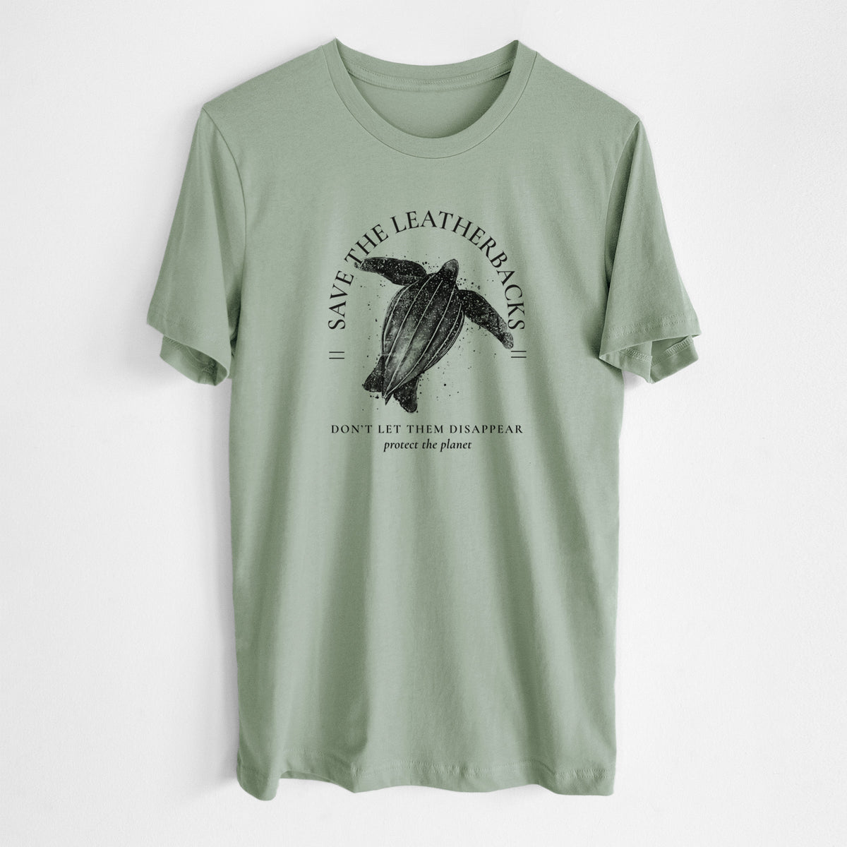 Sage green lightweight cotton t-shirt laid flat, printed with a black ink leatherback sea turtle framed by the words Save the Leatherbacks, Don't Let Them Disappear.