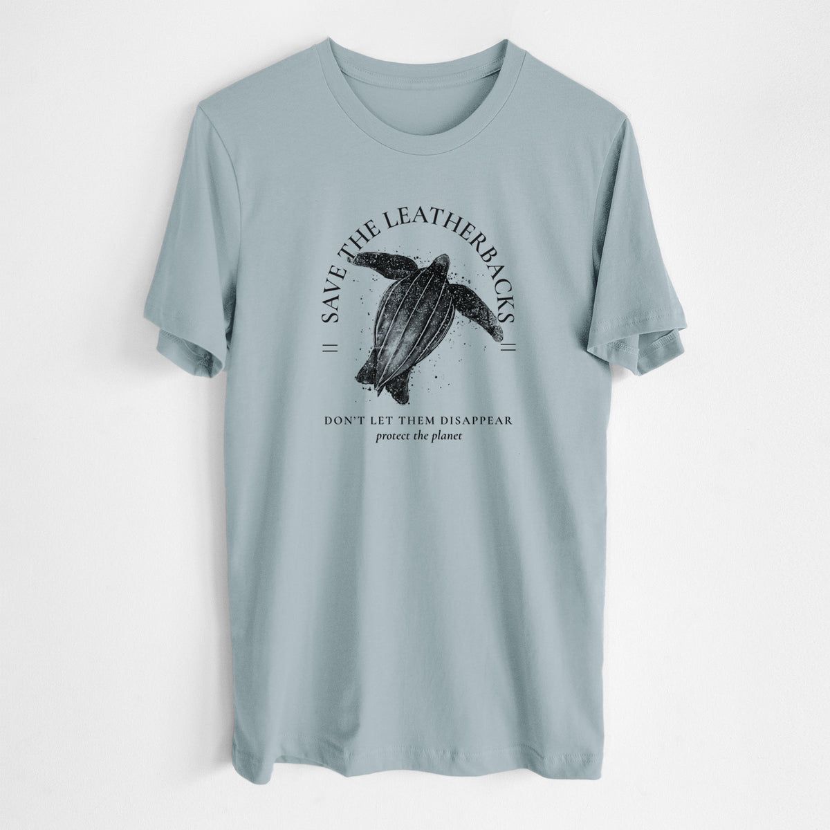 Vintage denim lightweight cotton t-shirt laid flat, printed with a black ink leatherback sea turtle framed by the words Save the Leatherbacks, Don't Let Them Disappear.