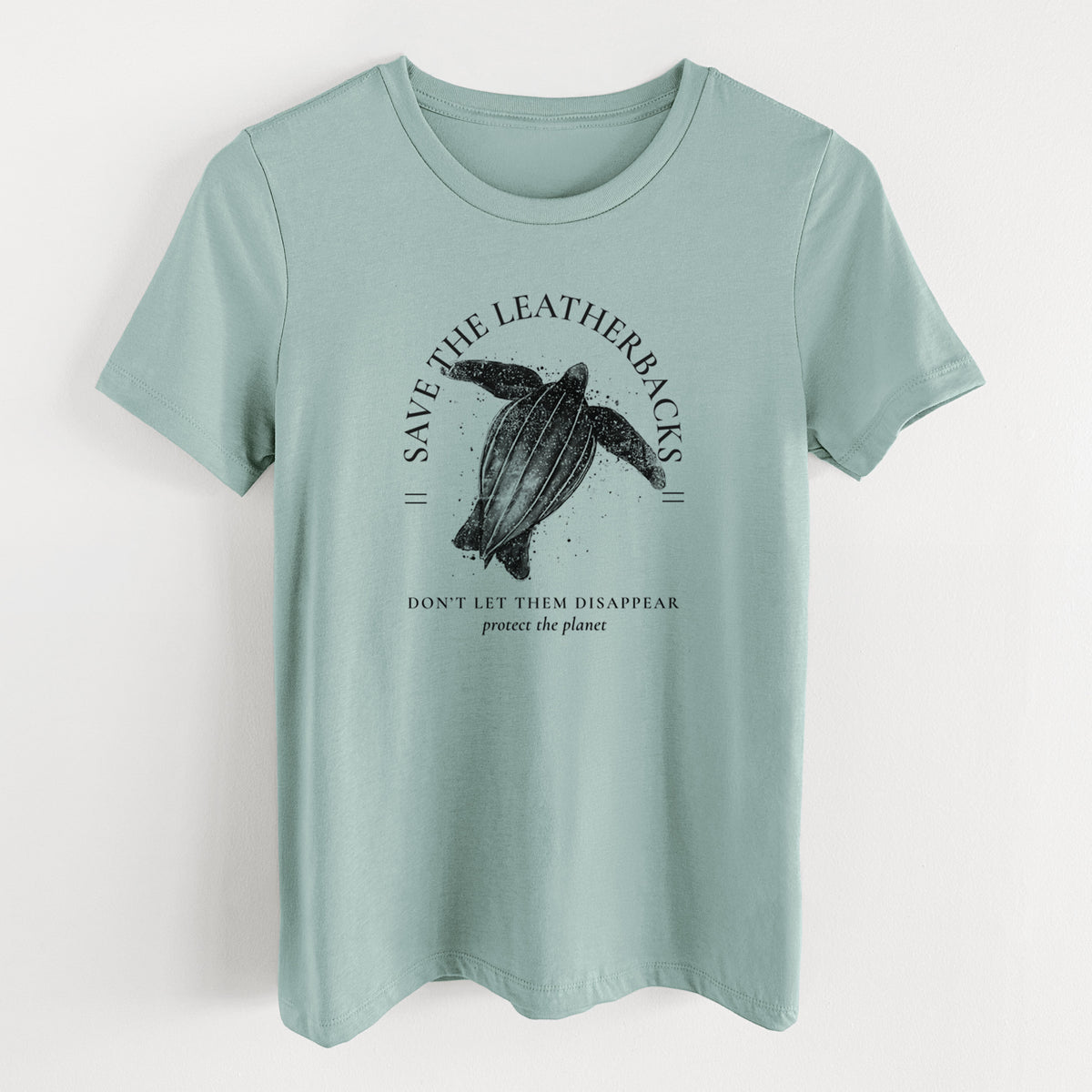 Dusty blue women's relaxed fit cotton t-shirt laid flat, printed with a black ink leatherback sea turtle framed by the words Save the Leatherbacks, Don't Let Them Disappear.