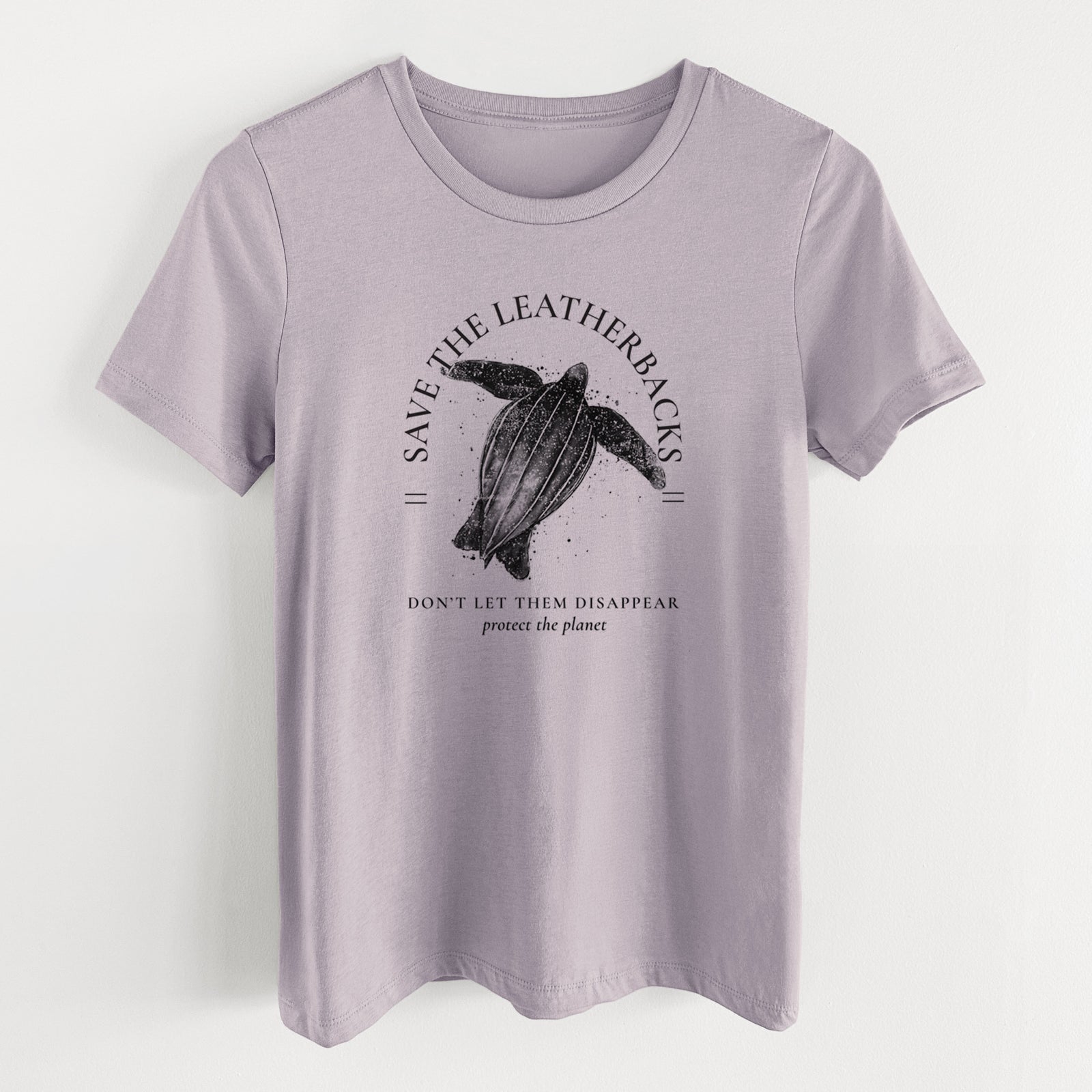 Light violet women's relaxed fit cotton t-shirt laid flat, printed with a black ink leatherback sea turtle framed by the words Save the Leatherbacks, Don't Let Them Disappear.