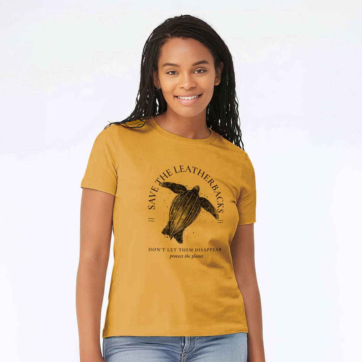 Woman wearing a mustard yellow women's relaxed fit cotton t-shirt printed with a black ink leatherback sea turtle framed by the words Save the Leatherbacks, Don't Let Them Disappear.