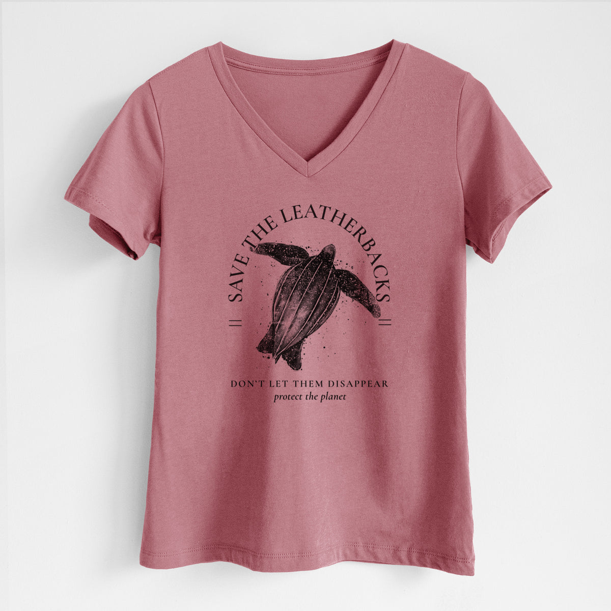 Mauve pink women's relaxed fit cotton V-neck t-shirt laid flat, printed with a black ink leatherback sea turtle framed by the words Save the Leatherbacks, Don't Let Them Disappear.