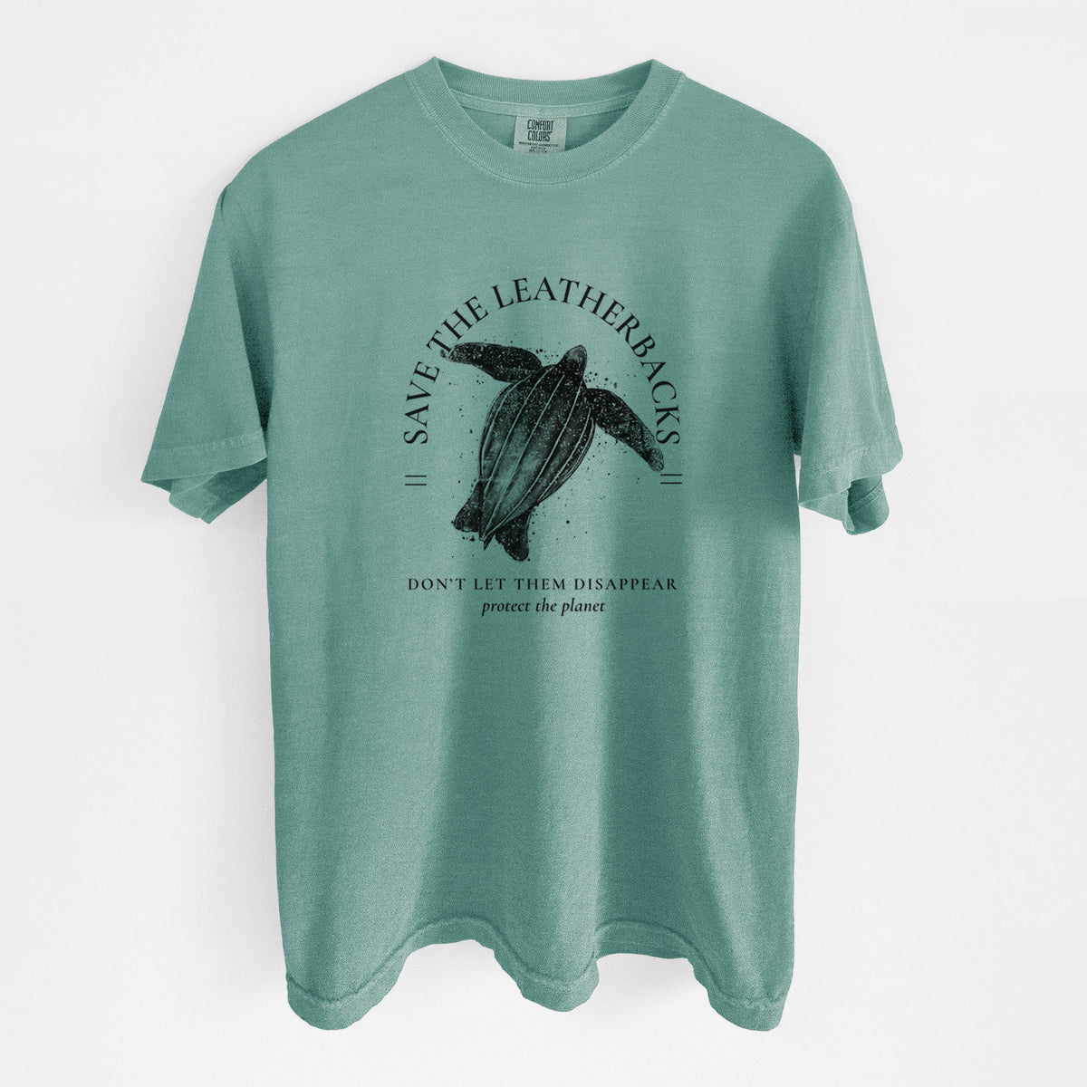 Reef green Comfort Colors t-shirt laid flat, printed with a black ink leatherback sea turtle framed by the words Save the Leatherbacks, Don't Let Them Disappear.