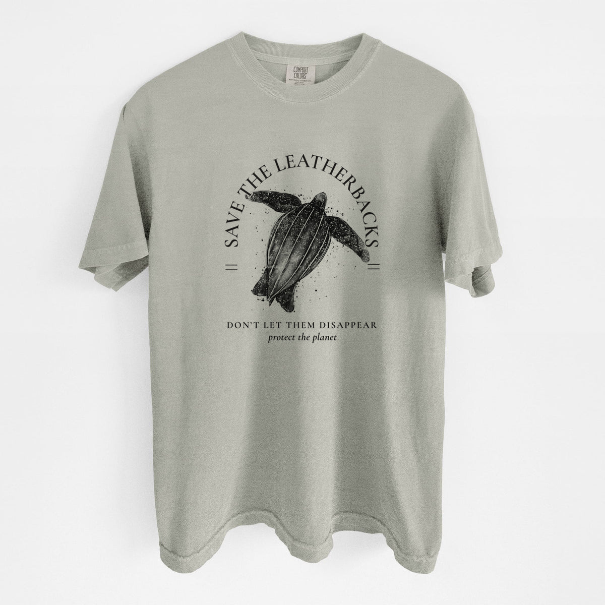 Sandstone beige Comfort Colors t-shirt laid flat, printed with a black ink leatherback sea turtle framed by the words Save the Leatherbacks, Don't Let Them Disappear.