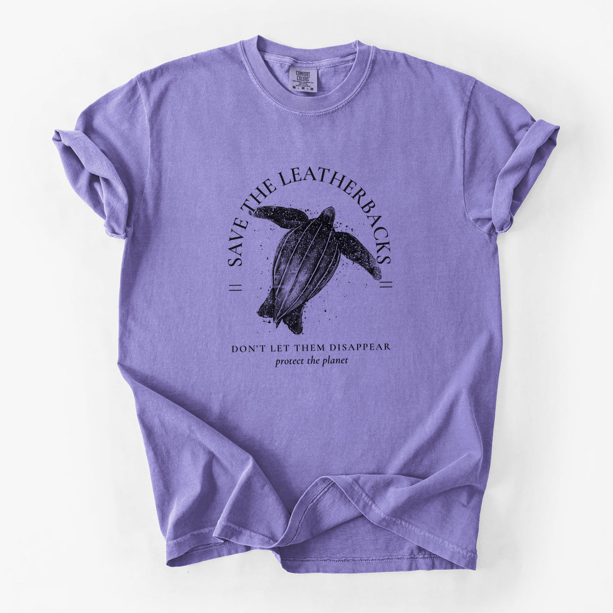 Violet purple Comfort Colors t-shirt laid flat, printed with a black ink leatherback sea turtle framed by the words Save the Leatherbacks, Don't Let Them Disappear.