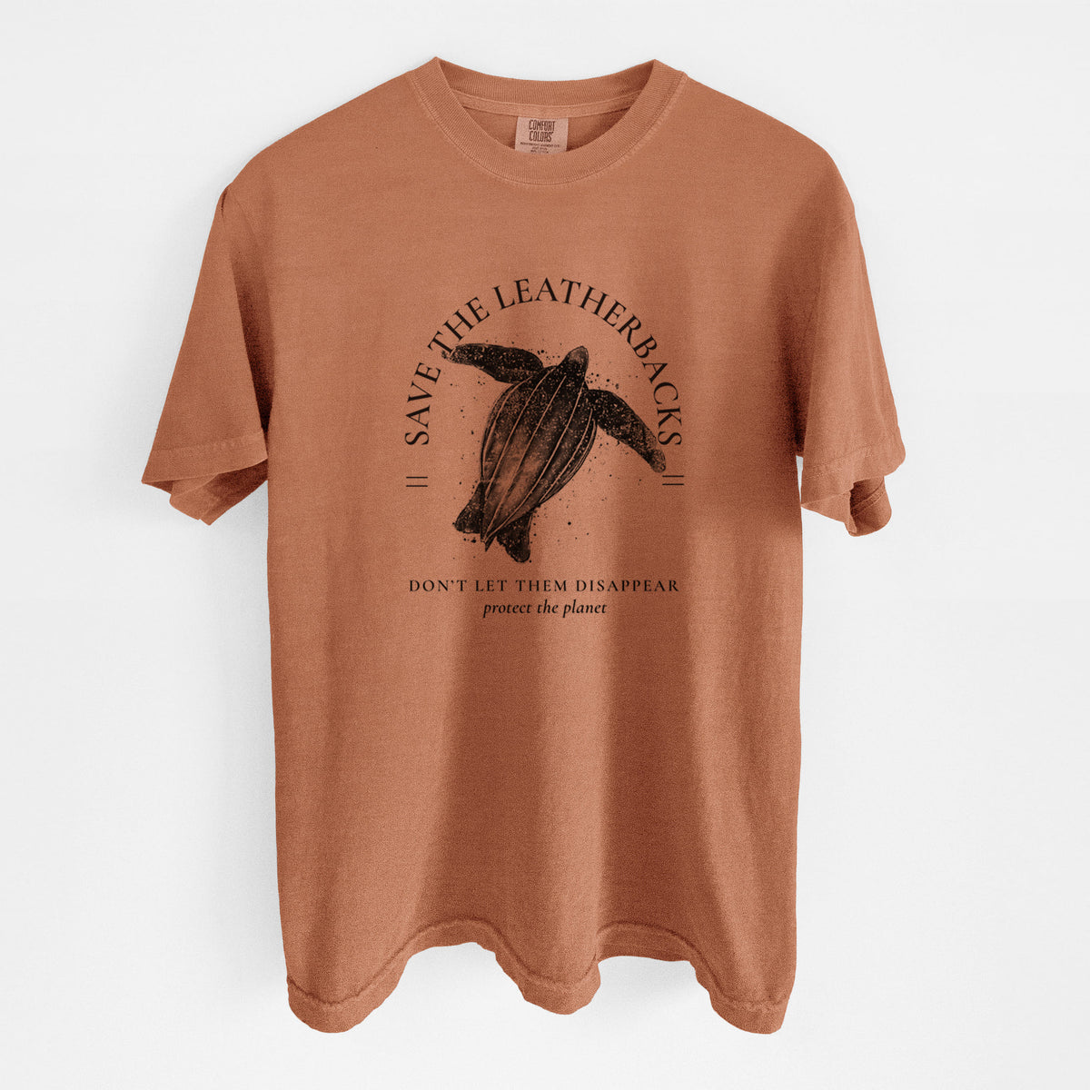 Yam burnt orange Comfort Colors t-shirt laid flat, printed with a black ink leatherback sea turtle framed by the words Save the Leatherbacks, Don't Let Them Disappear.