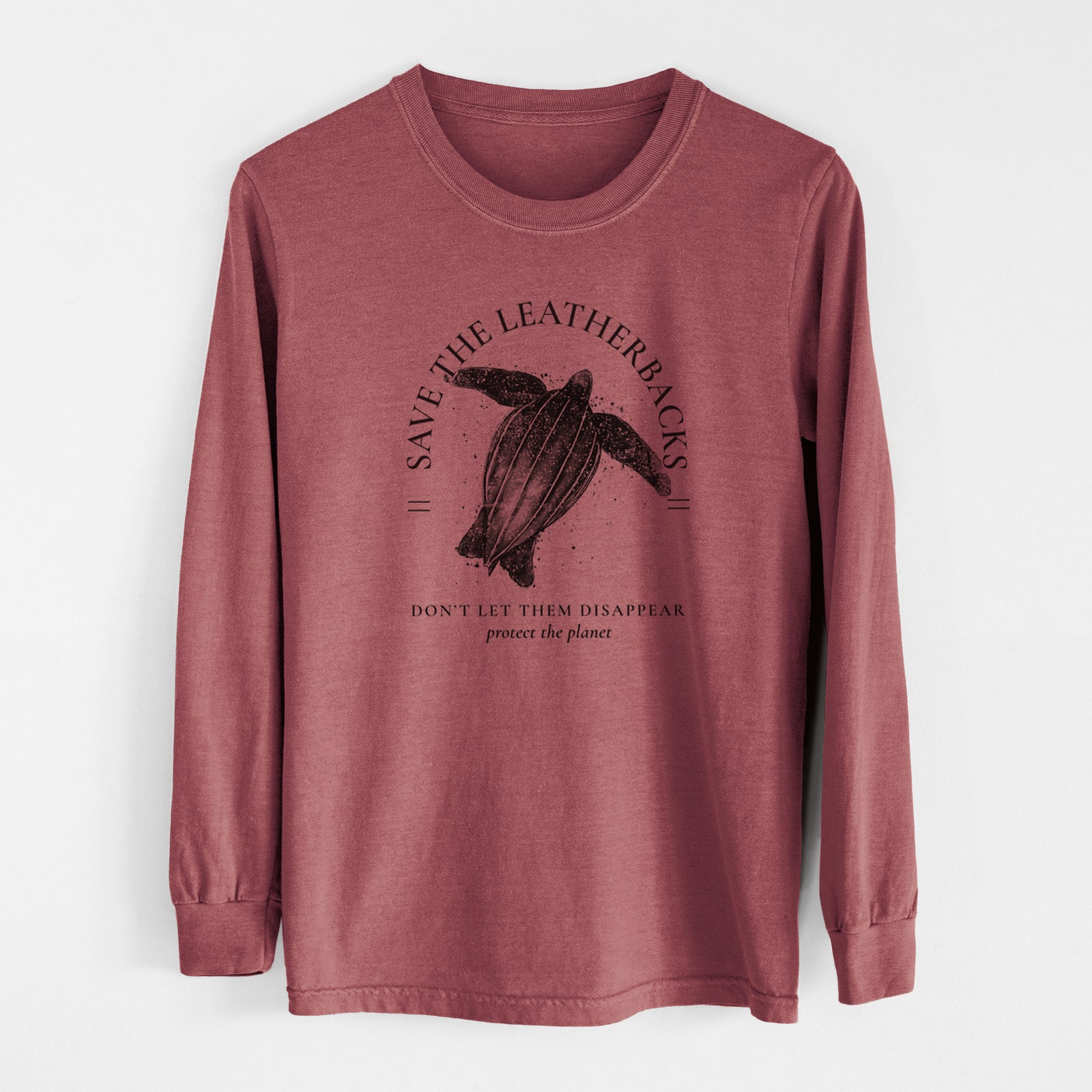 Ivory Comfort Colors long sleeve shirt laid flat, printed with a black ink leatherback sea turtle framed by the words Save the Leatherbacks, Don't Let Them Disappear.
