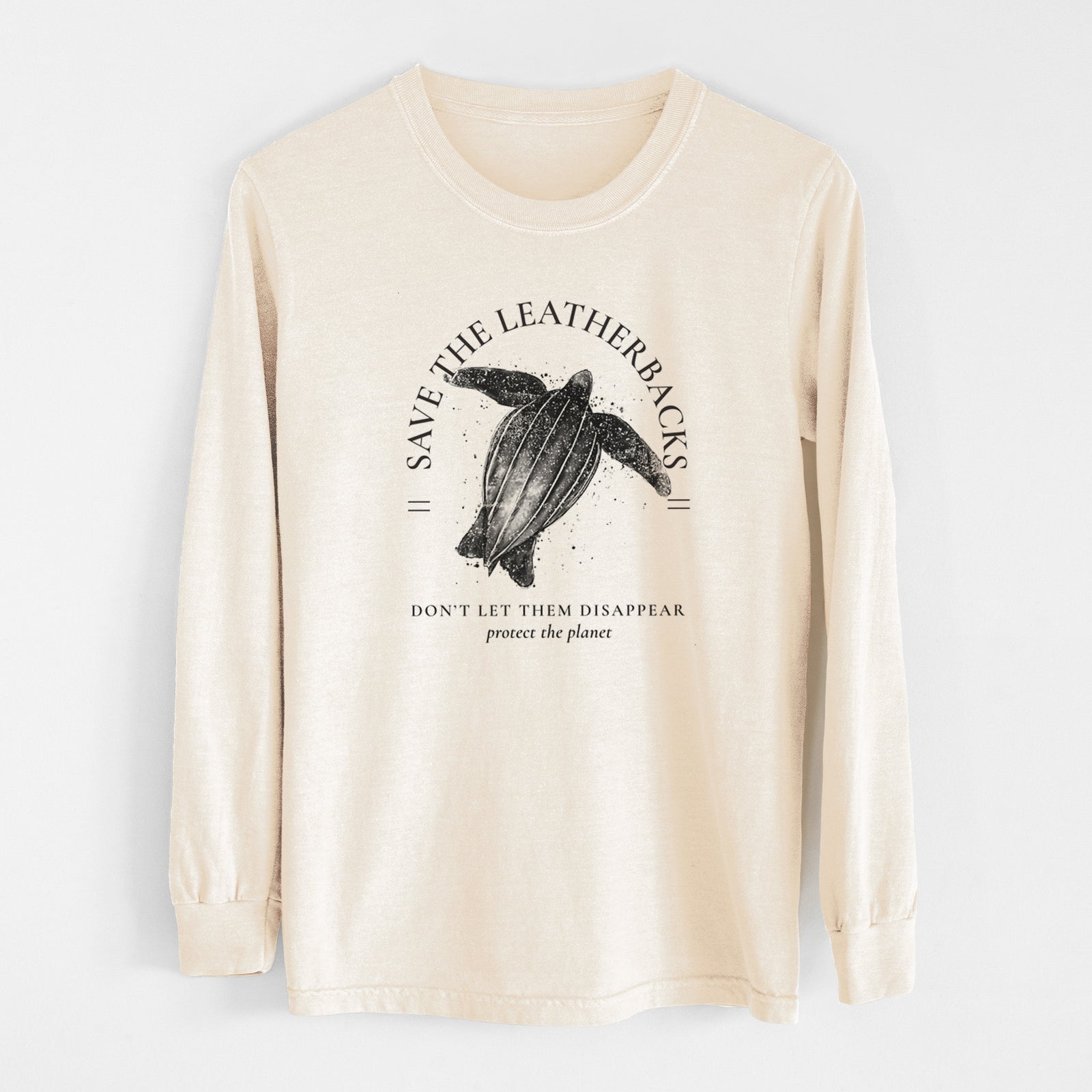 Ivory Comfort Colors long sleeve shirt laid flat, printed with a black ink leatherback sea turtle framed by the words Save the Leatherbacks, Don't Let Them Disappear.