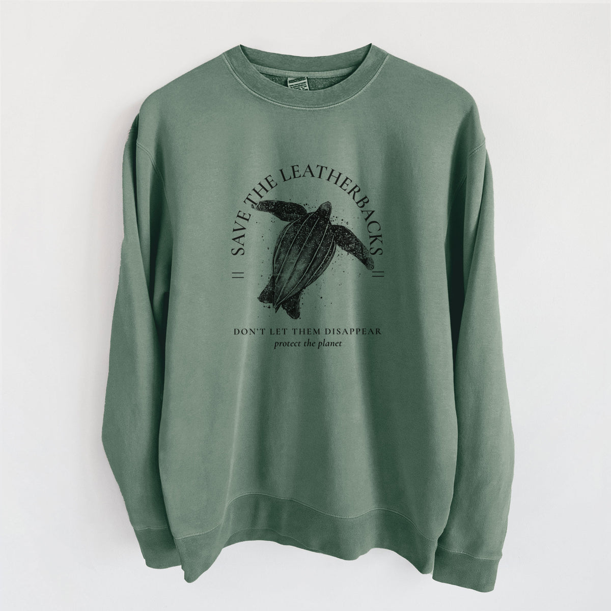 Alpine green pigment dyed crewneck sweatshirt laid flat, printed with a black ink leatherback sea turtle framed by the words Save the Leatherbacks, Don't Let Them Disappear.