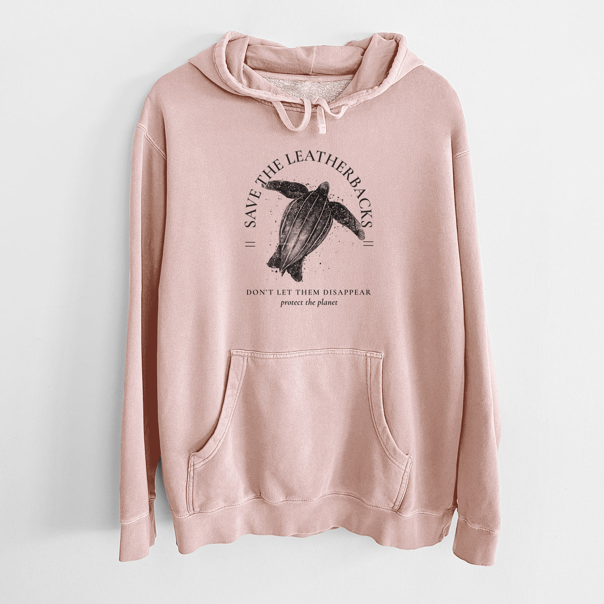 Dusty pink pigment dyed hoodie laid flat, printed with a black ink leatherback sea turtle framed by the words Save the Leatherbacks, Don't Let Them Disappear.