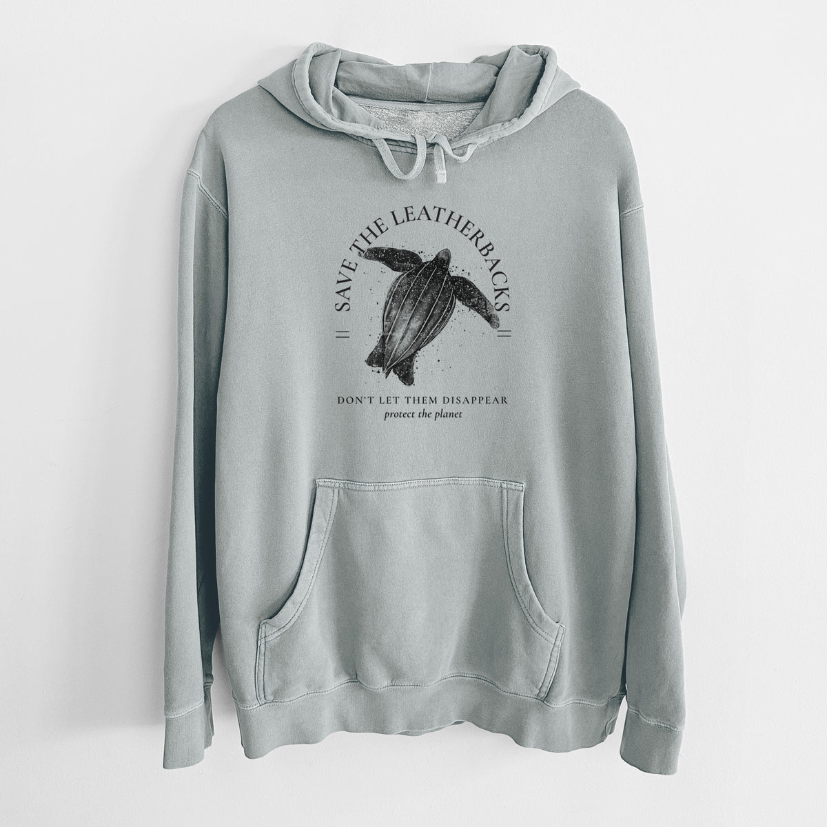 Sage green pigment dyed hoodie laid flat, printed with a black ink leatherback sea turtle framed by the words Save the Leatherbacks, Don't Let Them Disappear.