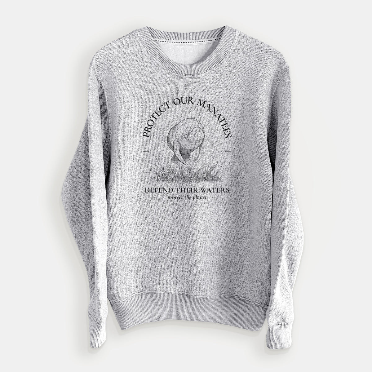 Salt and pepper knit sweatshirt laid flat, printed with a black ink illustration of a manatee among seagrass, framed by the words Protect Our Manatees, Defend Their Waters, Protect the Planet.