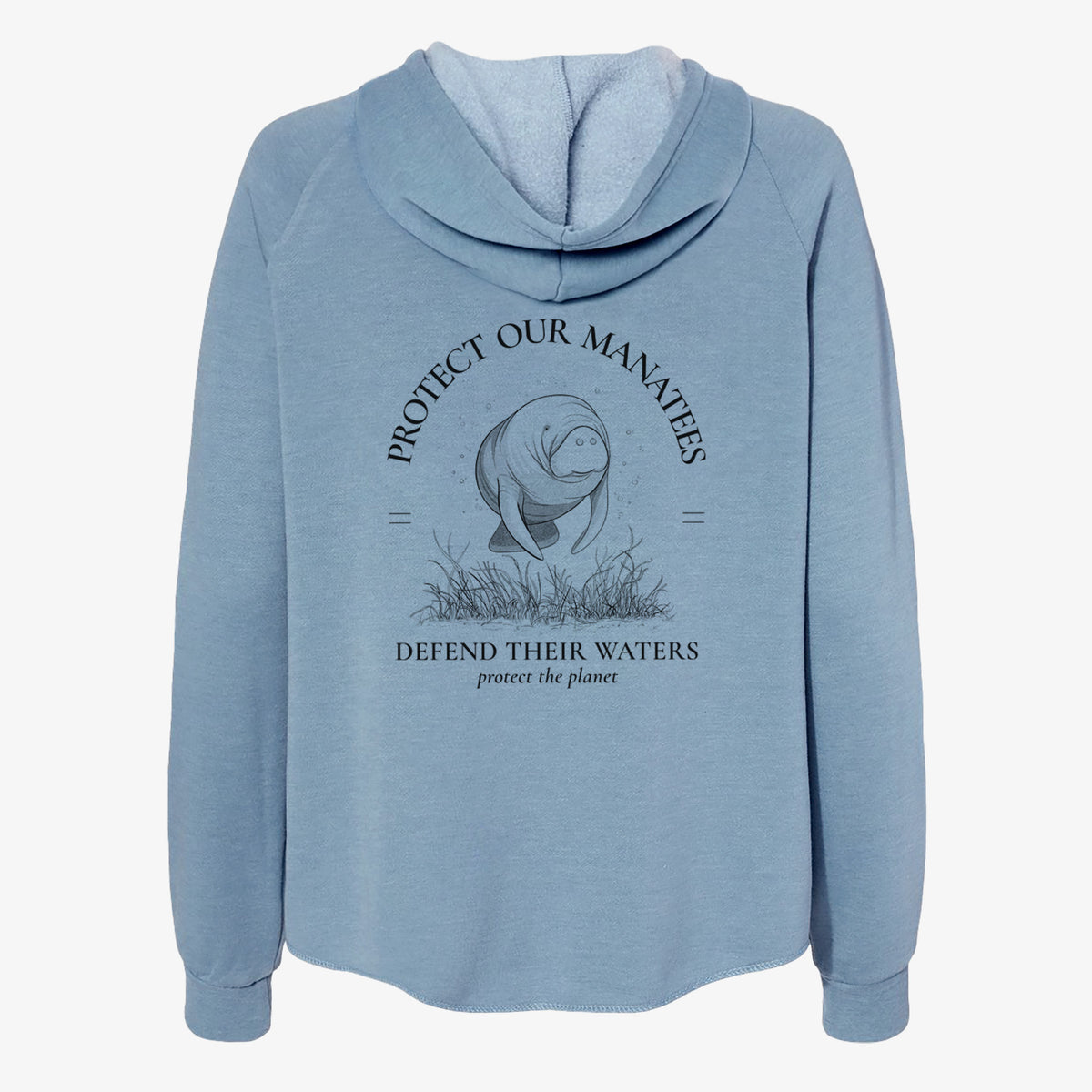 Misty blue women's Cali Wave zip-up sweatshirt laid flat, printed with a black ink illustration of a manatee among seagrass, framed by the words Protect Our Manatees, Defend Their Waters, Protect the Planet.