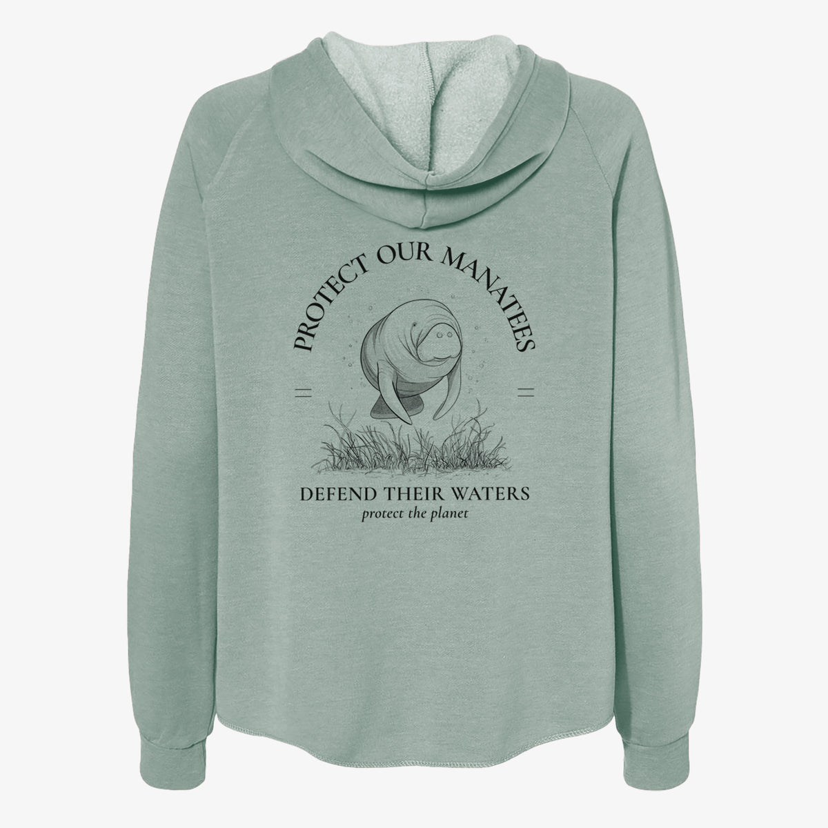 Sage green women's Cali Wave zip-up sweatshirt laid flat, printed with a black ink illustration of a manatee among seagrass, framed by the words Protect Our Manatees, Defend Their Waters, Protect the Planet.