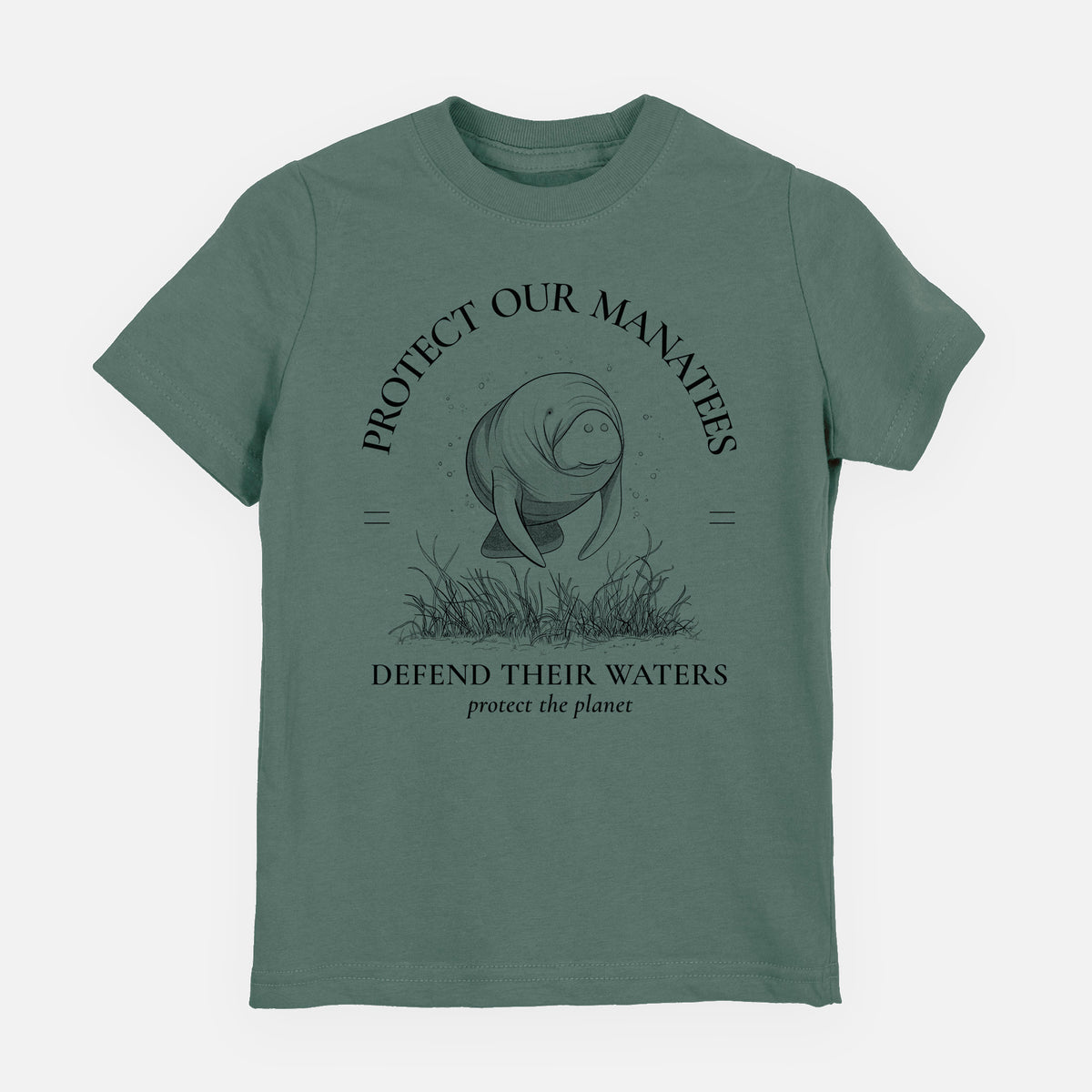 Basil green youth t-shirt laid flat, printed with a black ink illustration of a manatee among seagrass, framed by the words Protect Our Manatees, Defend Their Waters, Protect the Planet.