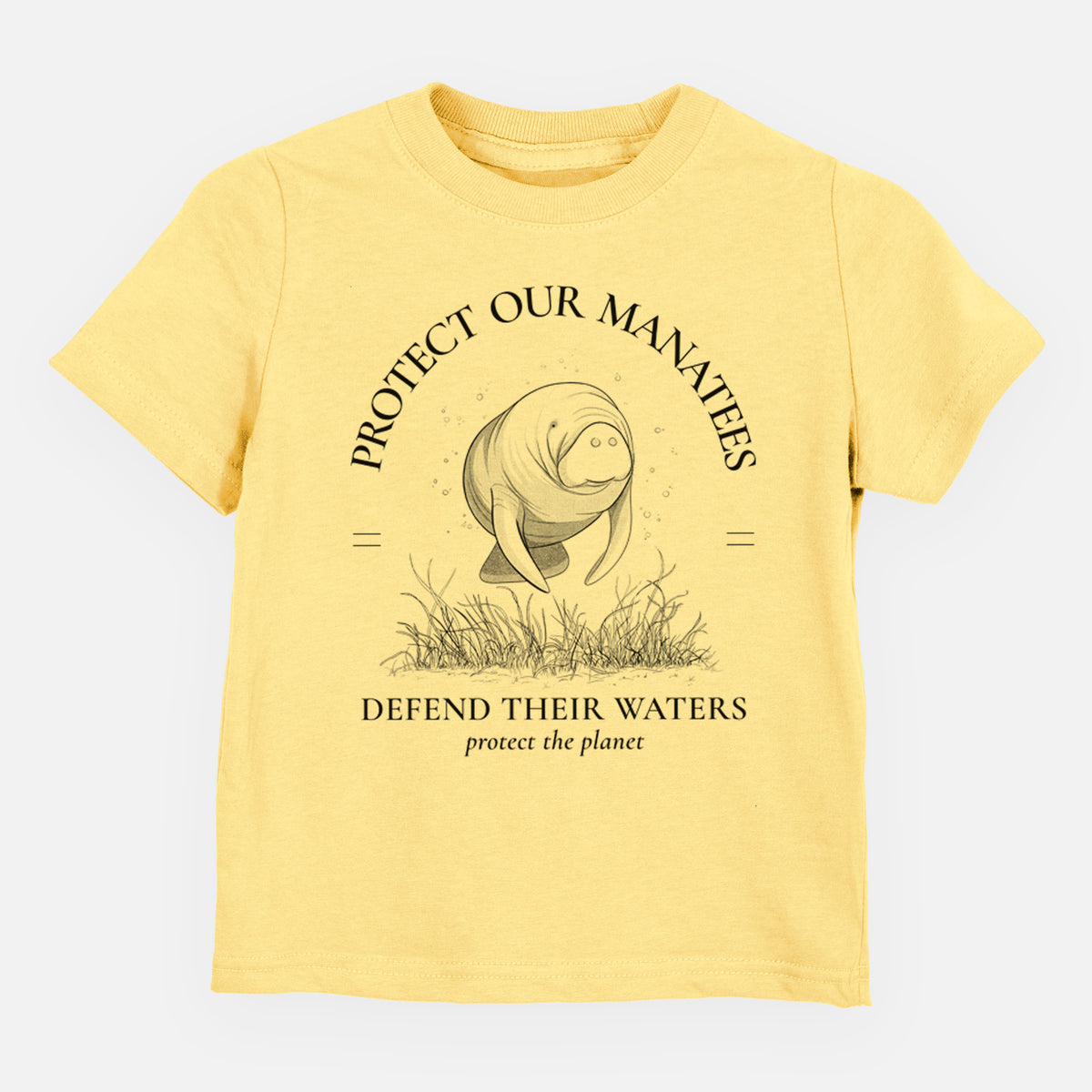 Butter yellow toddler t-shirt laid flat, printed with a black ink illustration of a manatee among seagrass, framed by the words Protect Our Manatees, Defend Their Waters, Protect the Planet.
