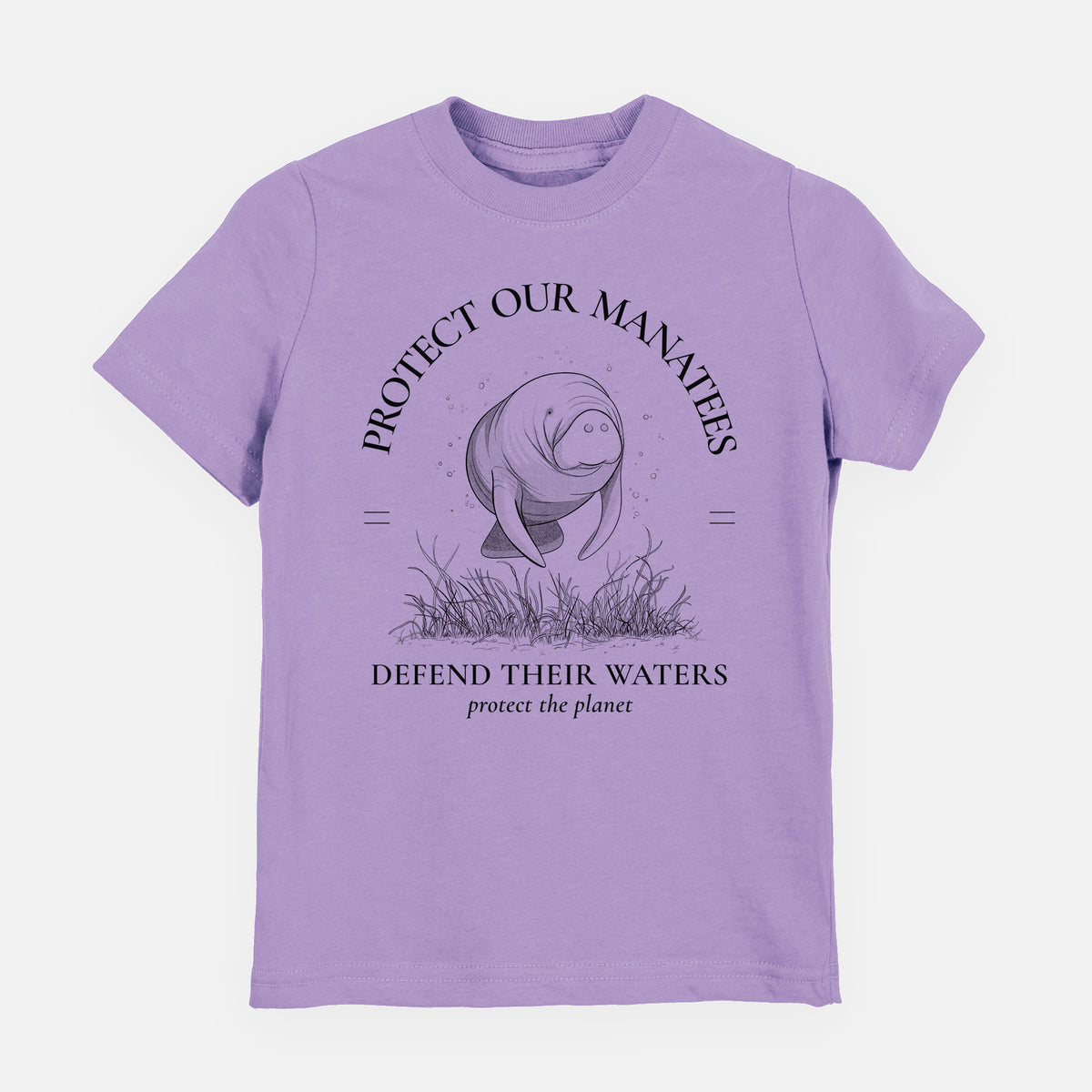 Lavender youth t-shirt laid flat, printed with a black ink illustration of a manatee among seagrass, framed by the words Protect Our Manatees, Defend Their Waters, Protect the Planet.