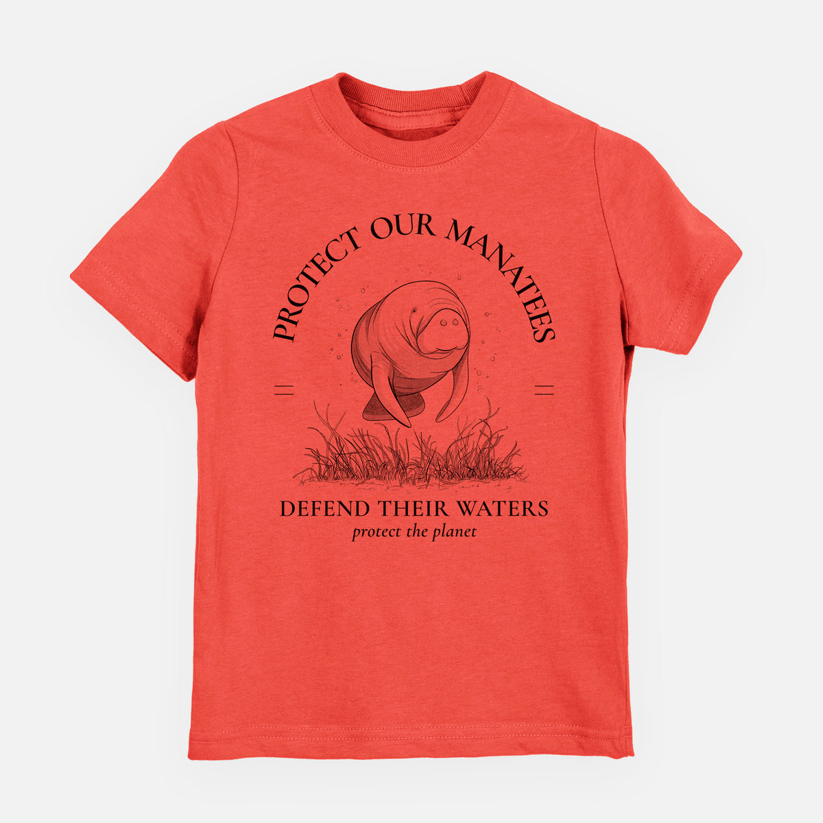 Passionfruit pink youth t-shirt laid flat, printed with a black ink illustration of a manatee among seagrass, framed by the words Protect Our Manatees, Defend Their Waters, Protect the Planet.