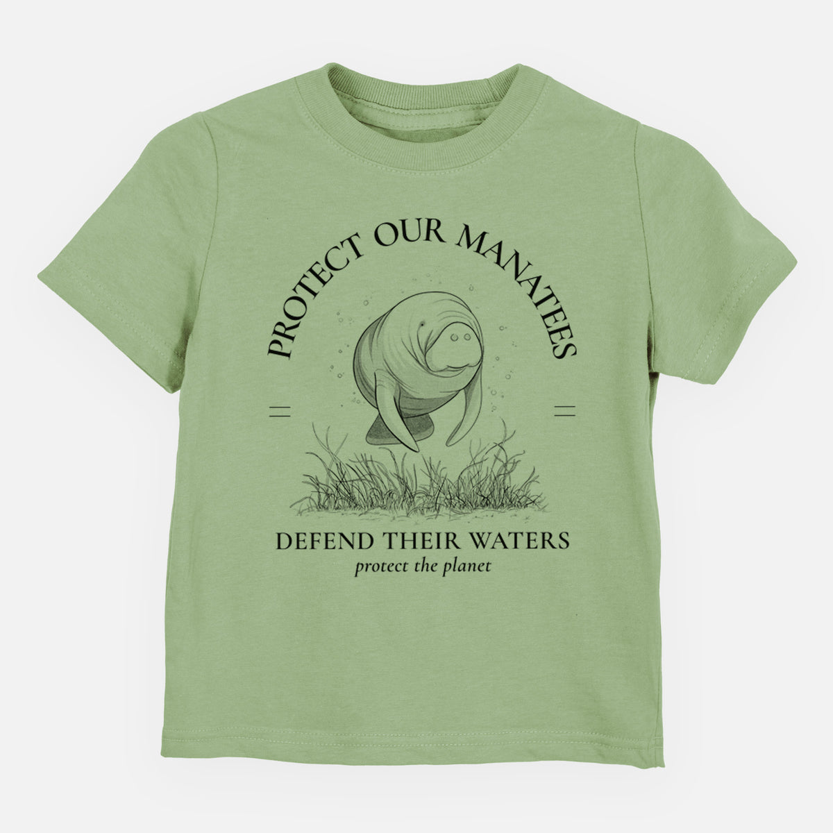 Sage green toddler t-shirt laid flat, printed with a black ink illustration of a manatee among seagrass, framed by the words Protect Our Manatees, Defend Their Waters, Protect the Planet.