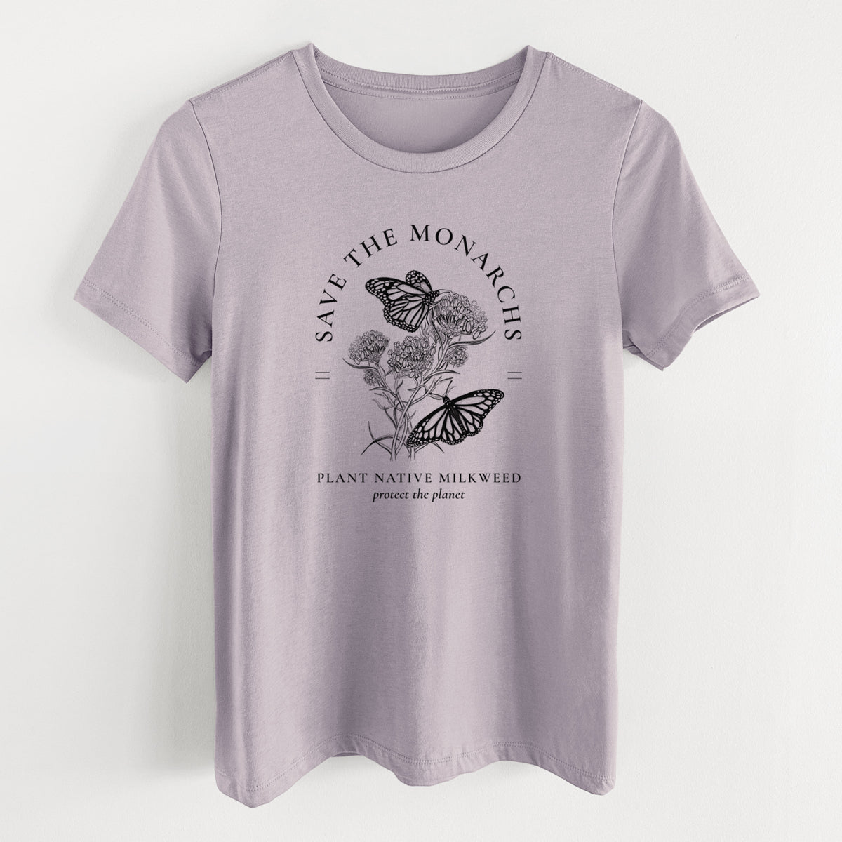 Light violet women's relaxed fit cotton t-shirt laid flat, printed with black ink monarch butterflies on milkweed flowers, framed by the words Save the Monarchs, Plant Native Milkweed.