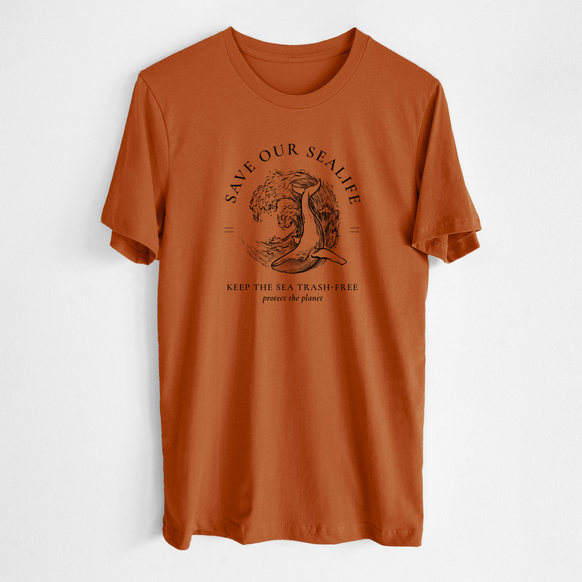 Autumn lightweight cotton t-shirt laid flat, printed with a black ink whale in an ocean wave framed by the words Save Our Sealife, Keep the Sea Trash-Free.
