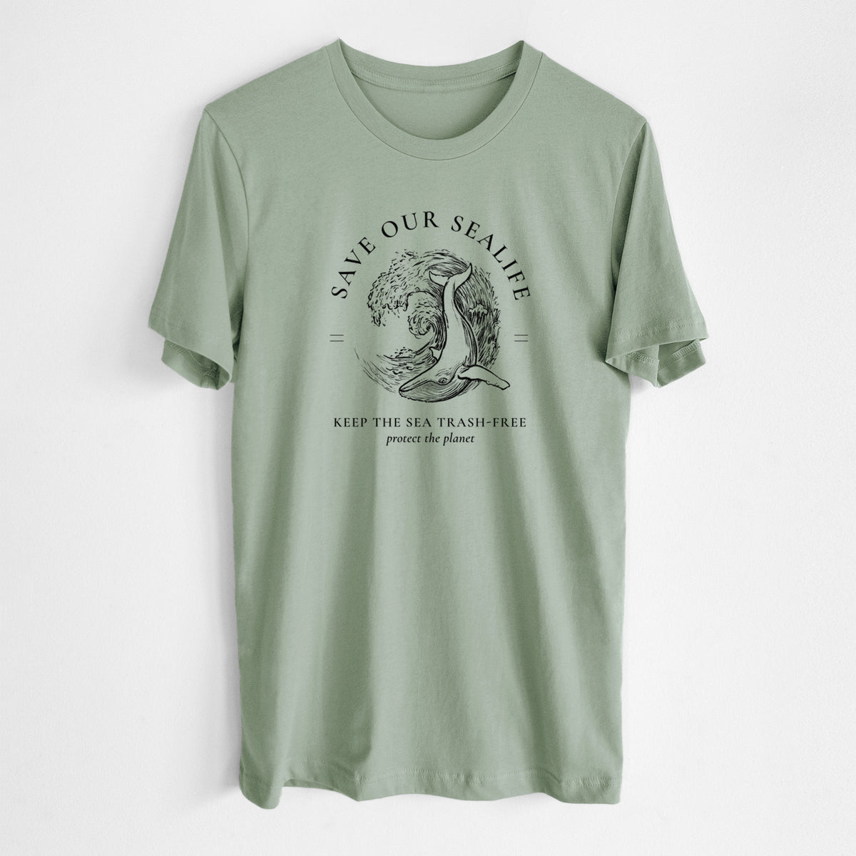 Sage green lightweight cotton t-shirt laid flat, printed with a black ink whale in an ocean wave framed by the words Save Our Sealife, Keep the Sea Trash-Free.