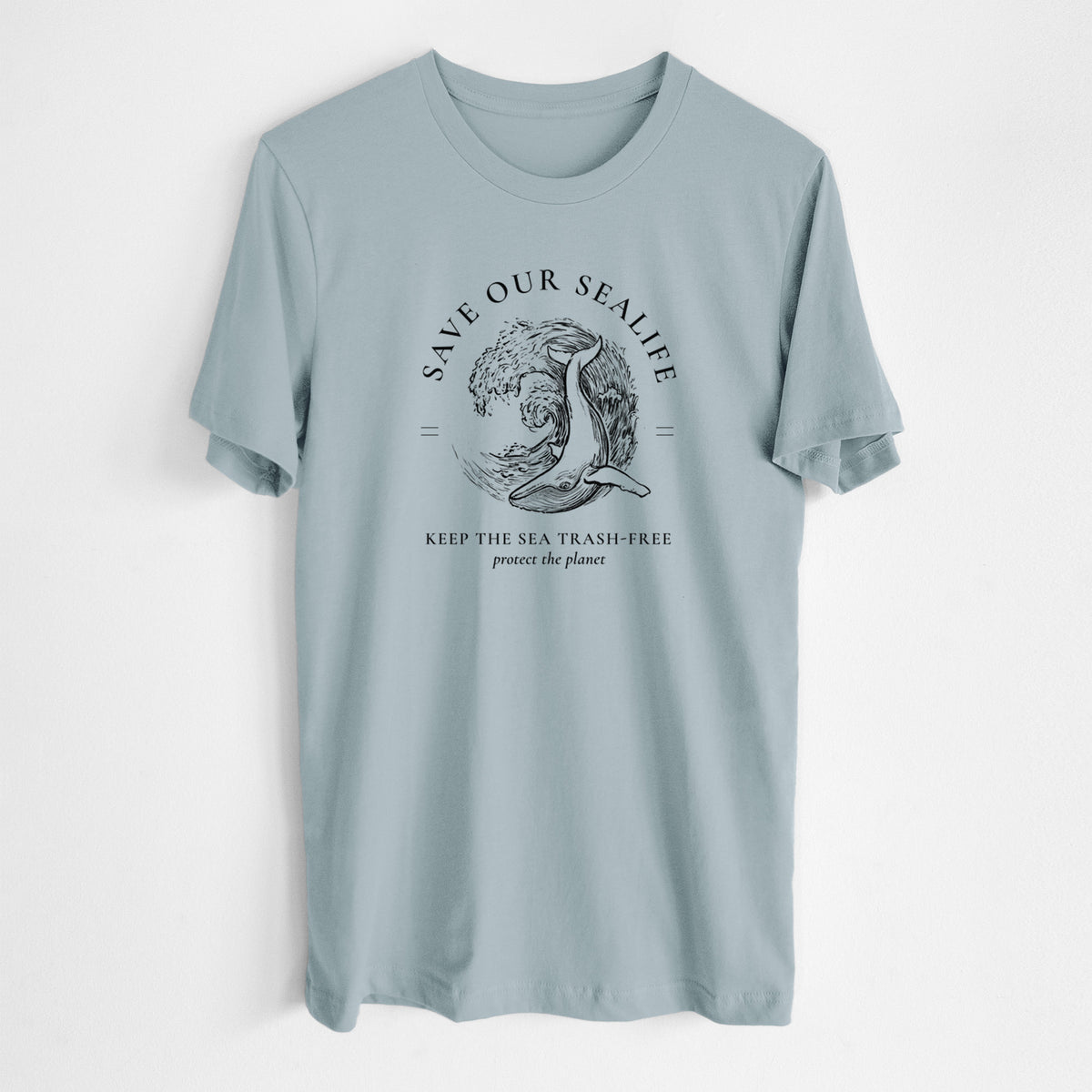 Vintage denim lightweight cotton t-shirt laid flat, printed with a black ink whale in an ocean wave framed by the words Save Our Sealife, Keep the Sea Trash-Free.