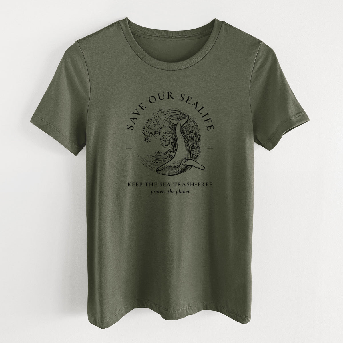 Military green women's relaxed fit cotton t-shirt laid flat, printed with a black ink whale in an ocean wave framed by the words Save Our Sealife, Keep the Sea Trash-Free.