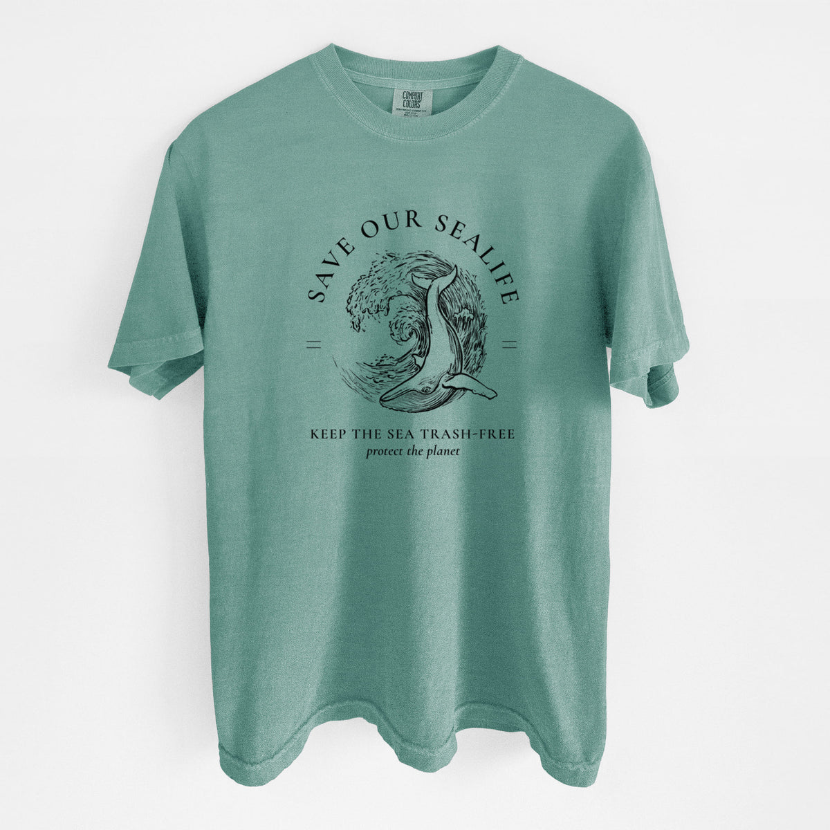 Reef green Comfort Colors t-shirt laid flat, printed with a black ink whale in an ocean wave framed by the words Save Our Sealife, Keep the Sea Trash-Free.