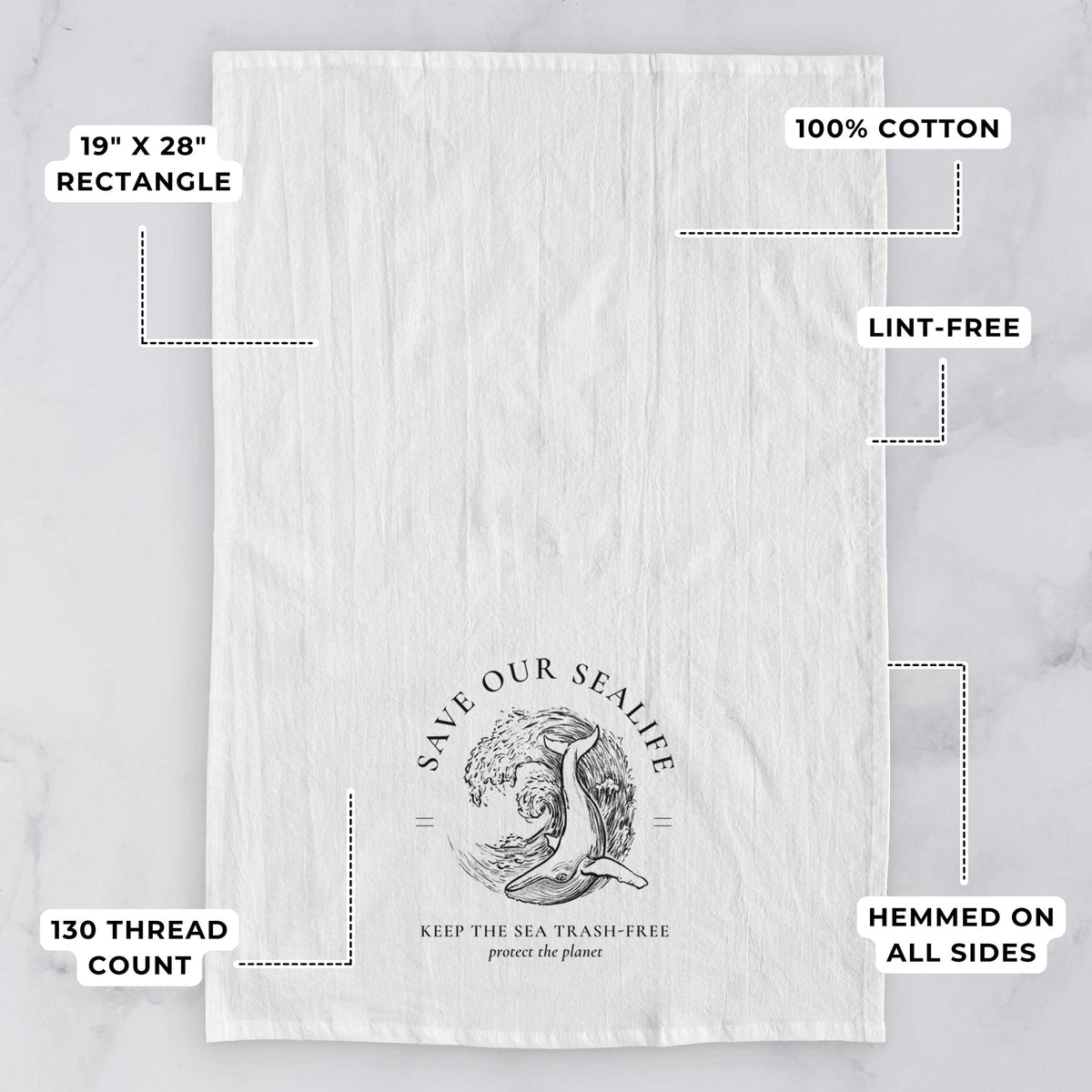 White tea towel printed with a black ink whale in an ocean wave framed by the words Save Our Sealife, Keep the Sea Trash-Free, with feature labels: 19 by 28 inch rectangle, 100% cotton, lint-free, 130 thread count, hemmed on all sides.