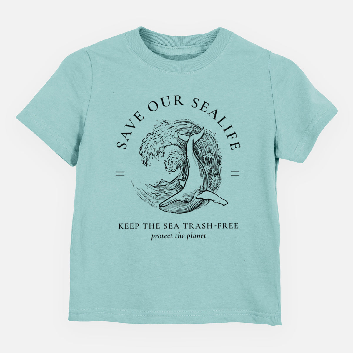 Saltwater toddler t-shirt laid flat, printed with a black ink whale in an ocean wave framed by the words Save Our Sealife, Keep the Sea Trash-Free.