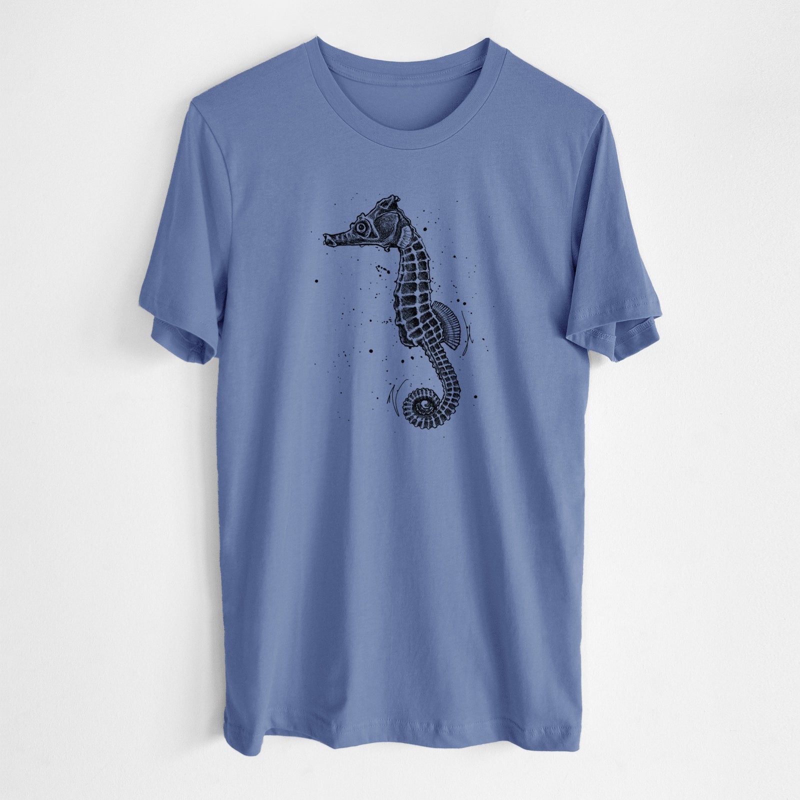 Blue bell lightweight cotton t-shirt laid flat, printed with a detailed black ink illustration of a Pacific seahorse with its tail curled.