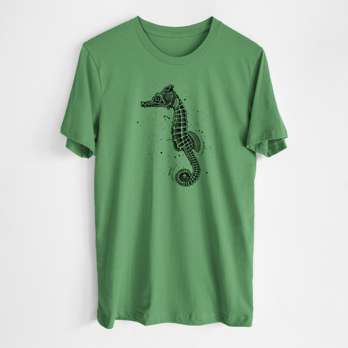 Leaf green lightweight cotton t-shirt laid flat, printed with a detailed black ink illustration of a Pacific seahorse with its tail curled.