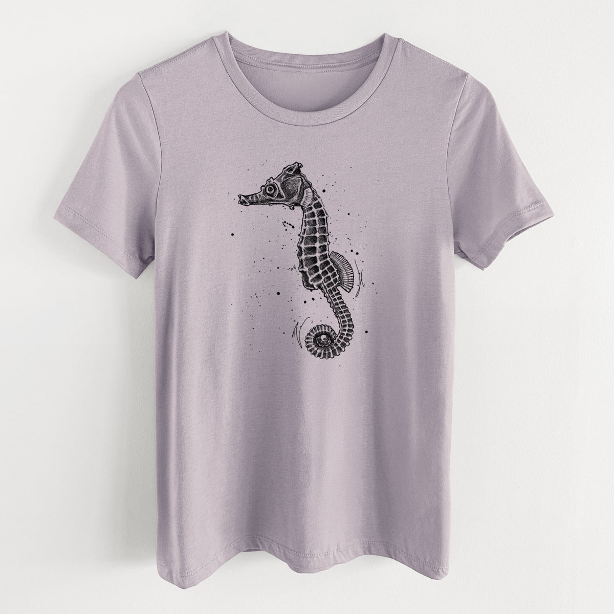 Light violet women's relaxed fit cotton t-shirt laid flat, printed with a detailed black ink illustration of a Pacific seahorse with its tail curled.