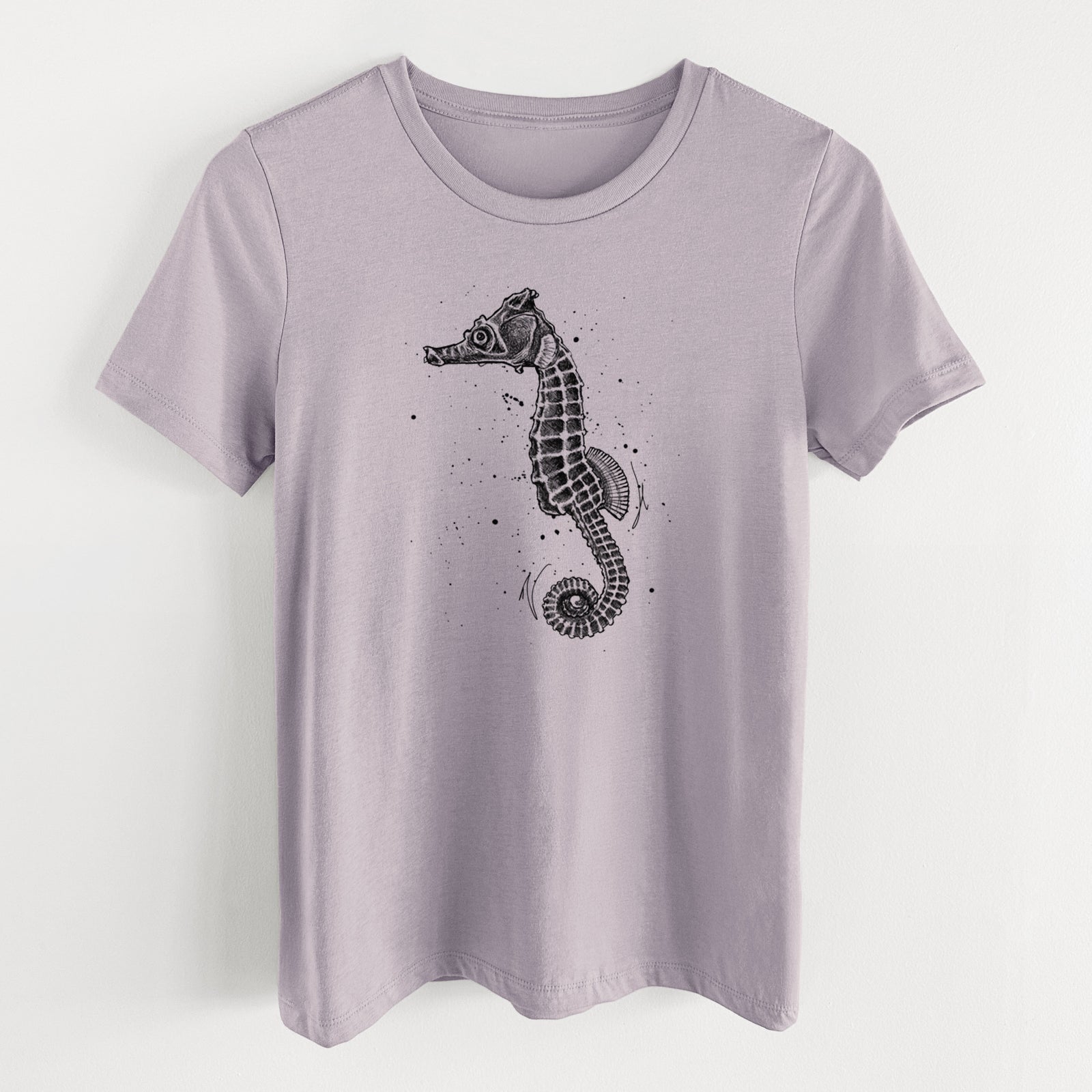 Light violet women's relaxed fit cotton t-shirt laid flat, printed with a detailed black ink illustration of a Pacific seahorse with its tail curled.