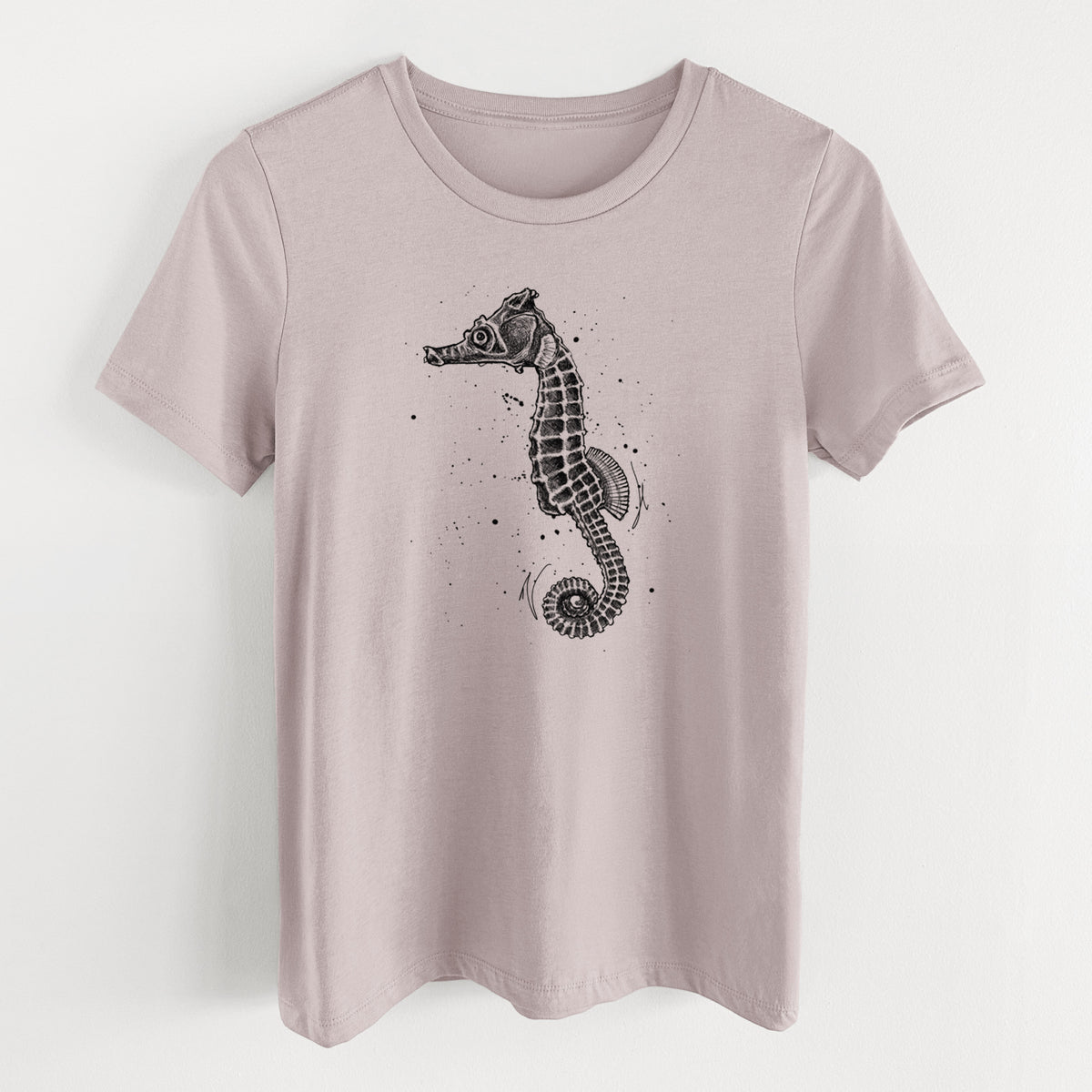 Pink gravel women's relaxed fit cotton t-shirt laid flat, printed with a detailed black ink illustration of a Pacific seahorse with its tail curled.