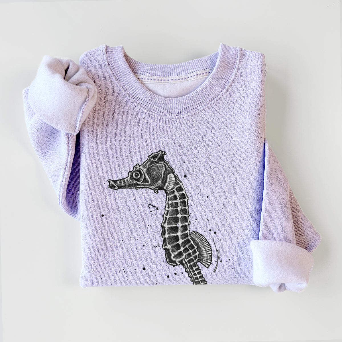 Ice purple knit sweatshirt printed with a detailed black ink illustration of a Pacific seahorse with its tail curled, styled flat.