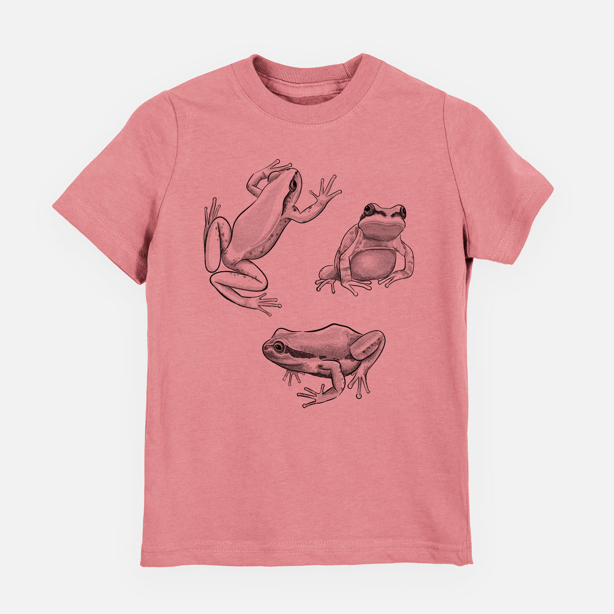 Mauve pink youth t-shirt laid flat, printed with a black ink illustration of three Pacific tree frogs in different poses.