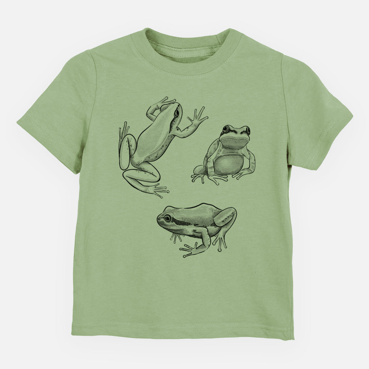 Sage green toddler t-shirt laid flat, printed with a black ink illustration of three Pacific tree frogs in different poses.