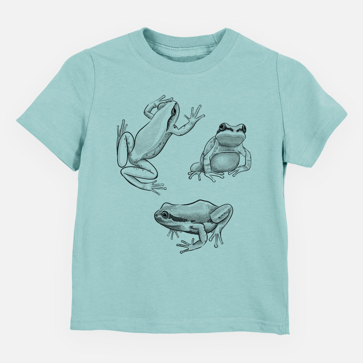 Saltwater toddler t-shirt laid flat, printed with a black ink illustration of three Pacific tree frogs in different poses.