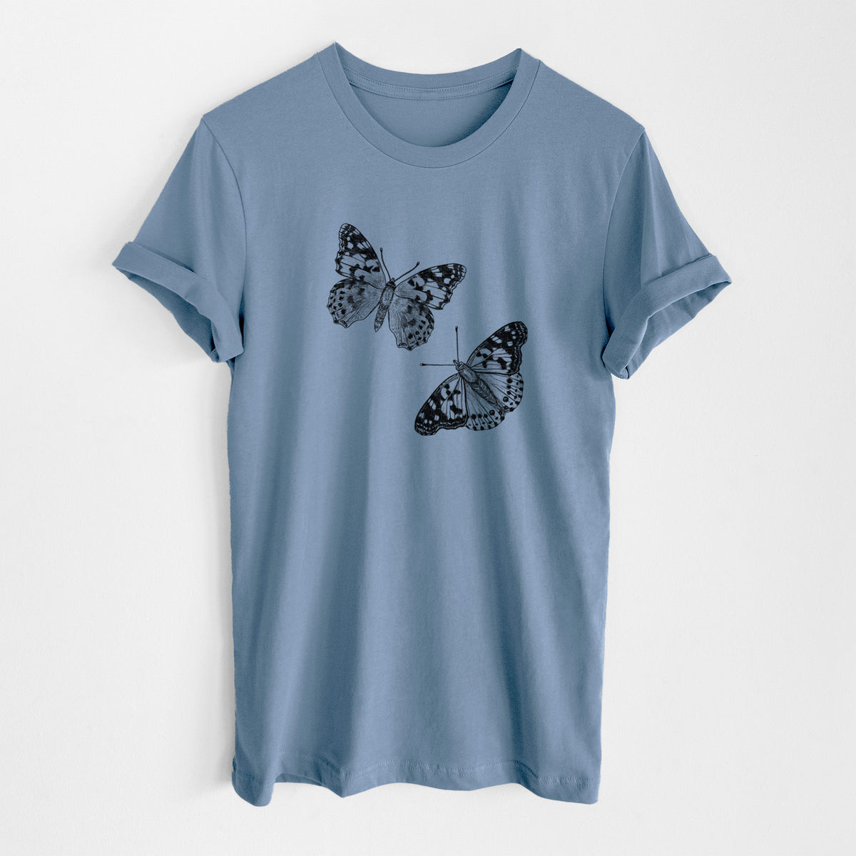 Steel blue lightweight cotton t-shirt laid flat, printed with a detailed black ink illustration of two painted lady butterflies.