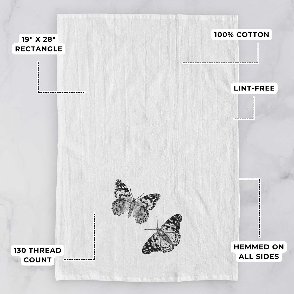 White tea towel printed with a detailed black ink illustration of two painted lady butterflies, with feature labels: 19 by 28 inch rectangle, 100% cotton, lint-free, 130 thread count, hemmed on all sides.