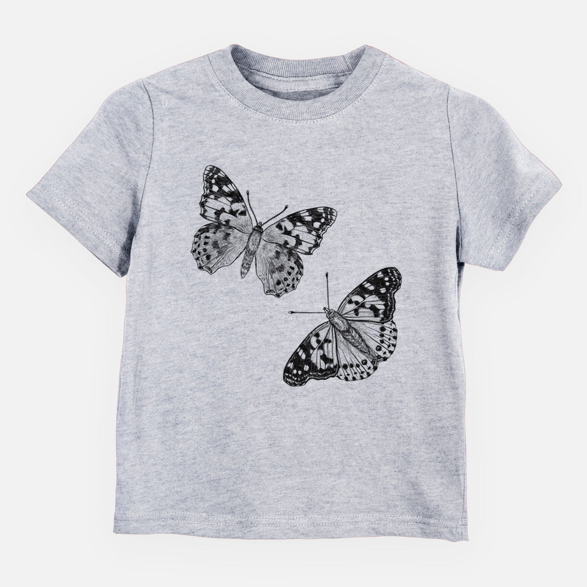 Heather grey toddler t-shirt laid flat, printed with a detailed black ink illustration of two painted lady butterflies.
